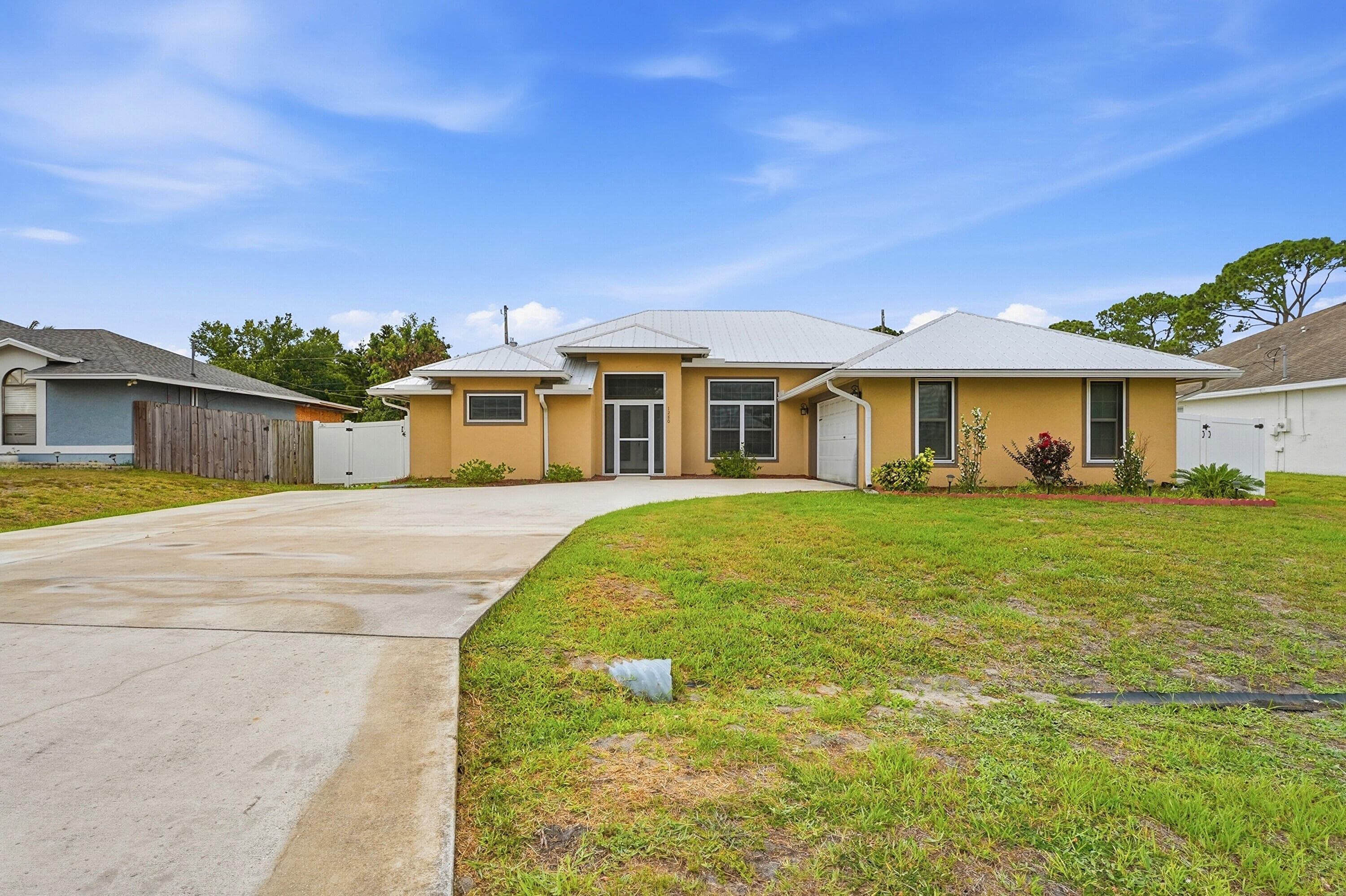 1280 SW Kalevala Drive, Port St. Lucie, FL 34953 — photo 1 of 36