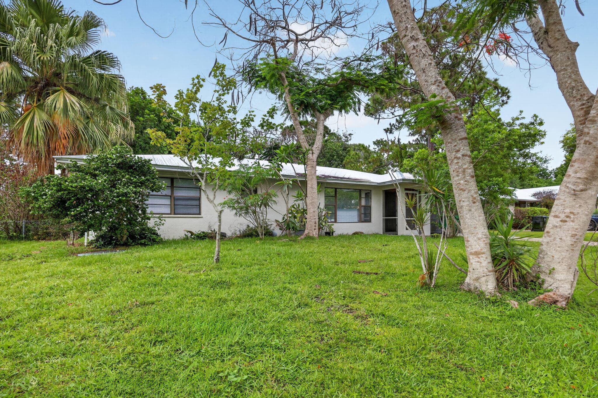 941 SE Atlantus Avenue, Port St. Lucie, FL 34983 — photo 3 of 73