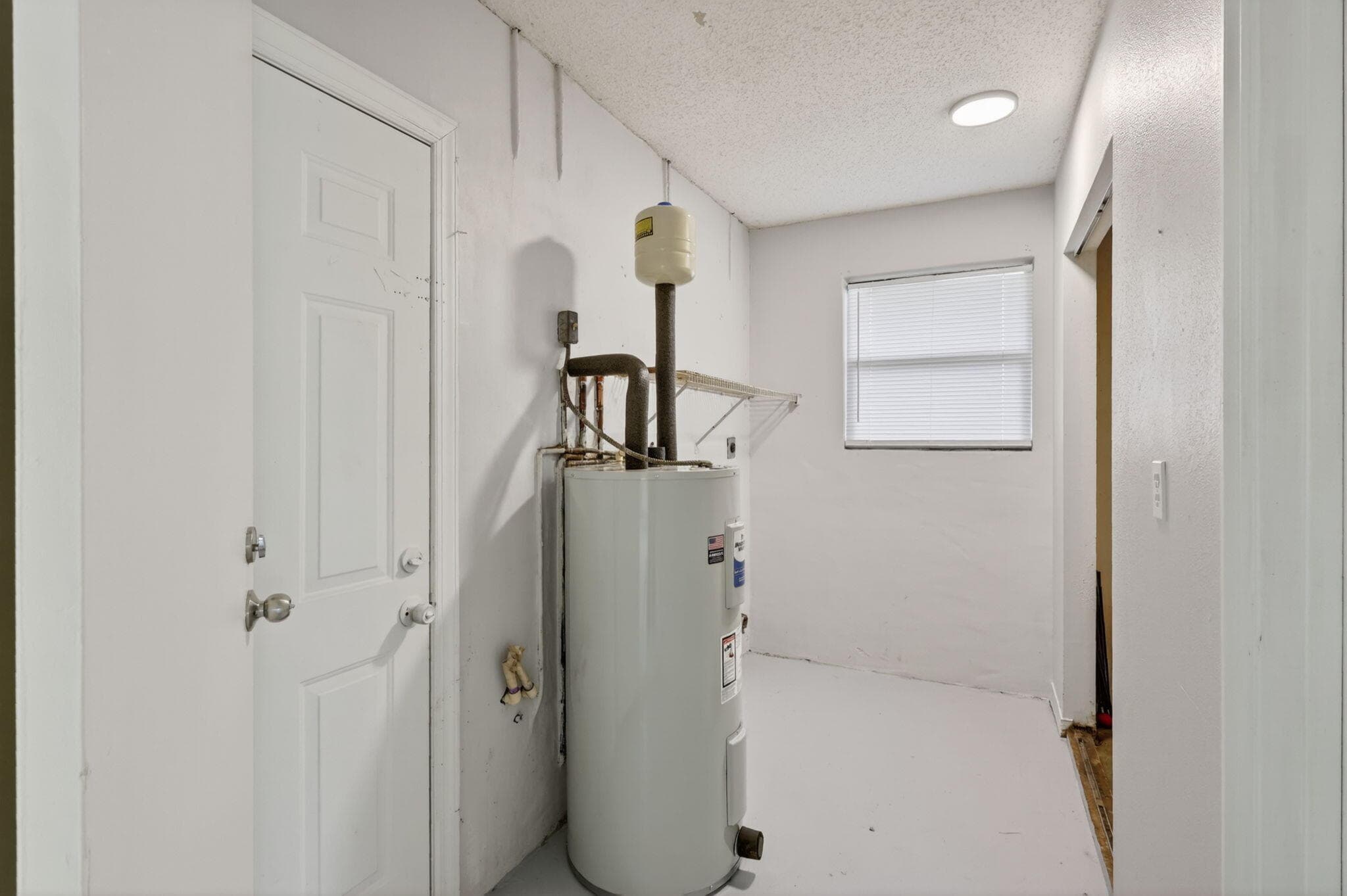 941 SE Atlantus Avenue, Port St. Lucie, FL 34983 — photo 12 of 73