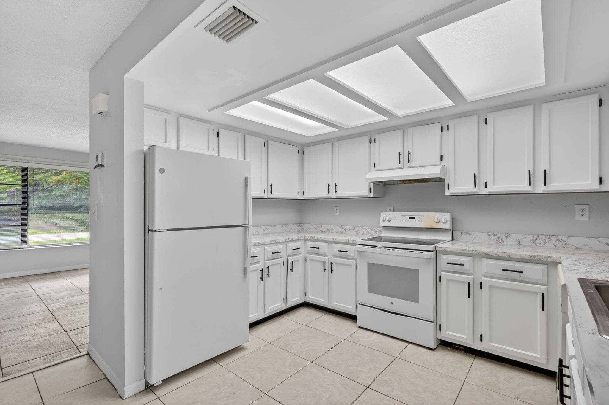 941 SE Atlantus Avenue, Port St. Lucie, FL 34983 — photo 15 of 73