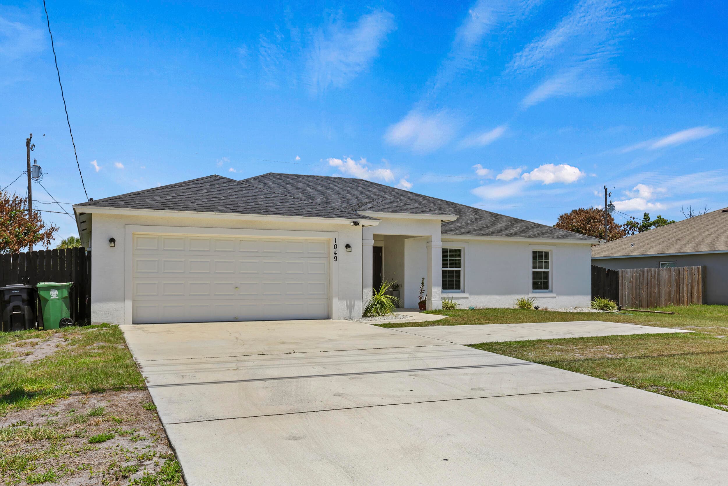 1049 SW Paar Drive, Port St. Lucie, FL 34953 — photo 2 of 46