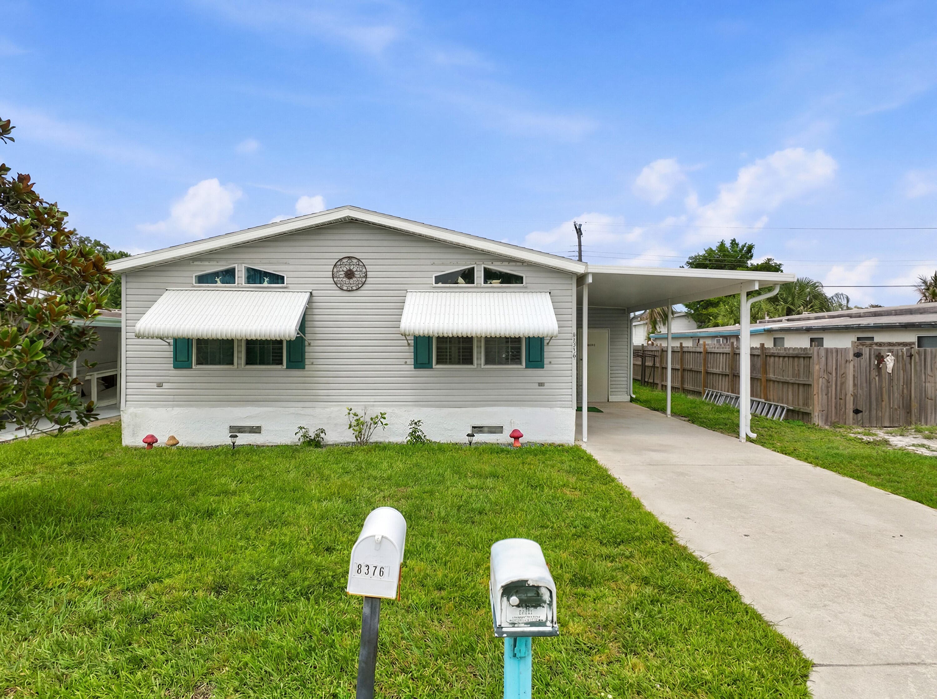 8355 SE Wren Avenue, Hobe Sound, FL 33455 — photo 1 of 39