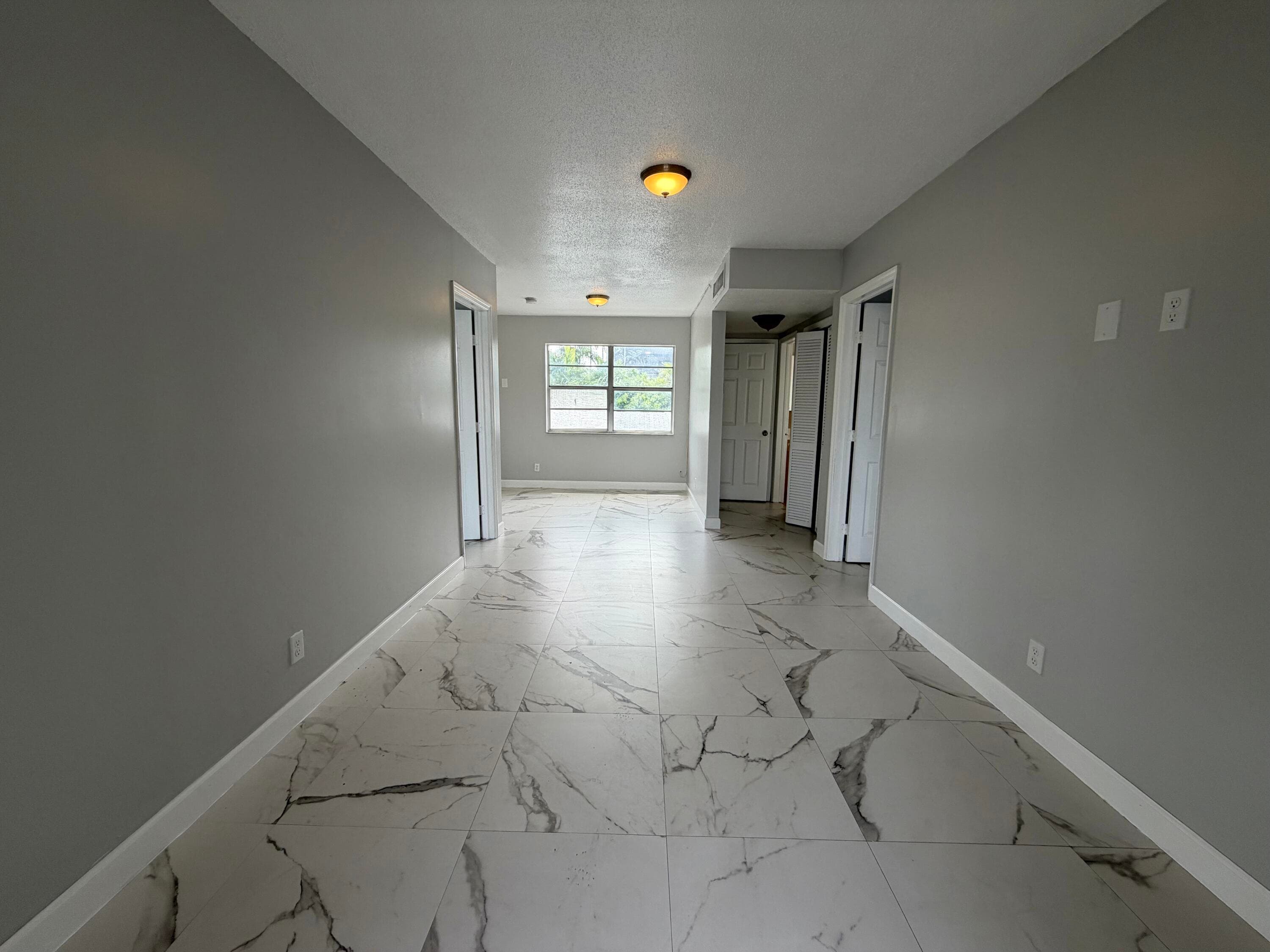915 NE 8th Street 202, Hallandale Beach, FL 33009 — photo 1 of 10
