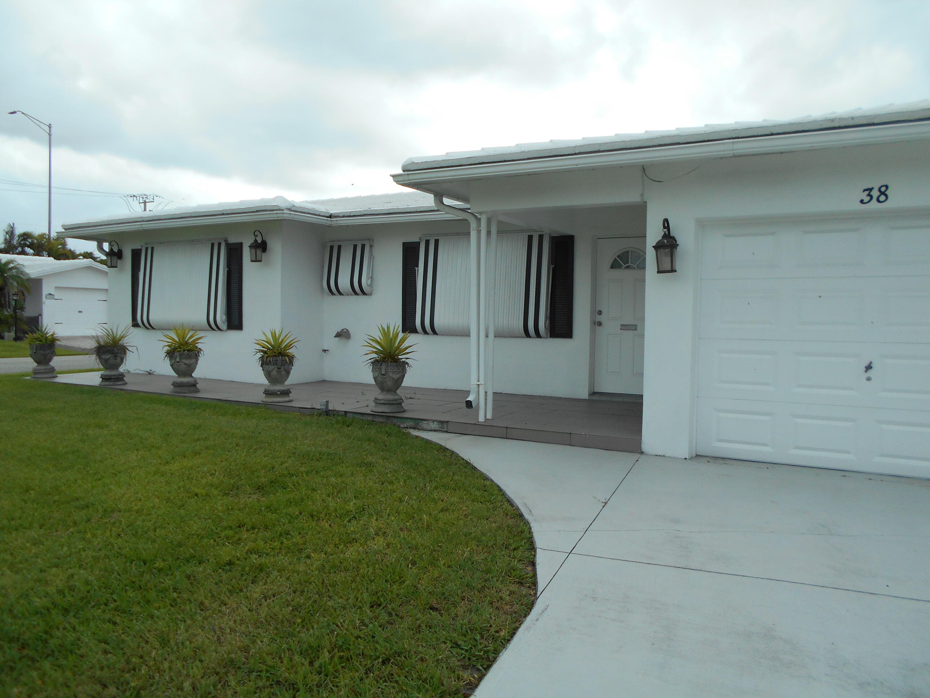 38 Leisure Boulevard, Pompano Beach, FL 33064 — photo 1 of 25