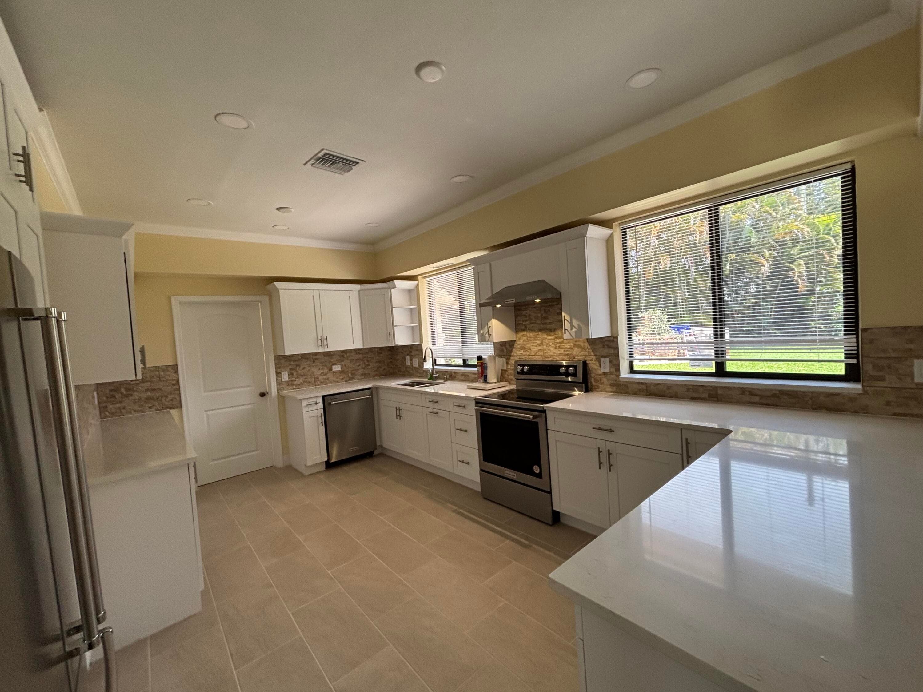135 E Ilex Drive, Lake Park, FL 33403 — photo 9 of 22