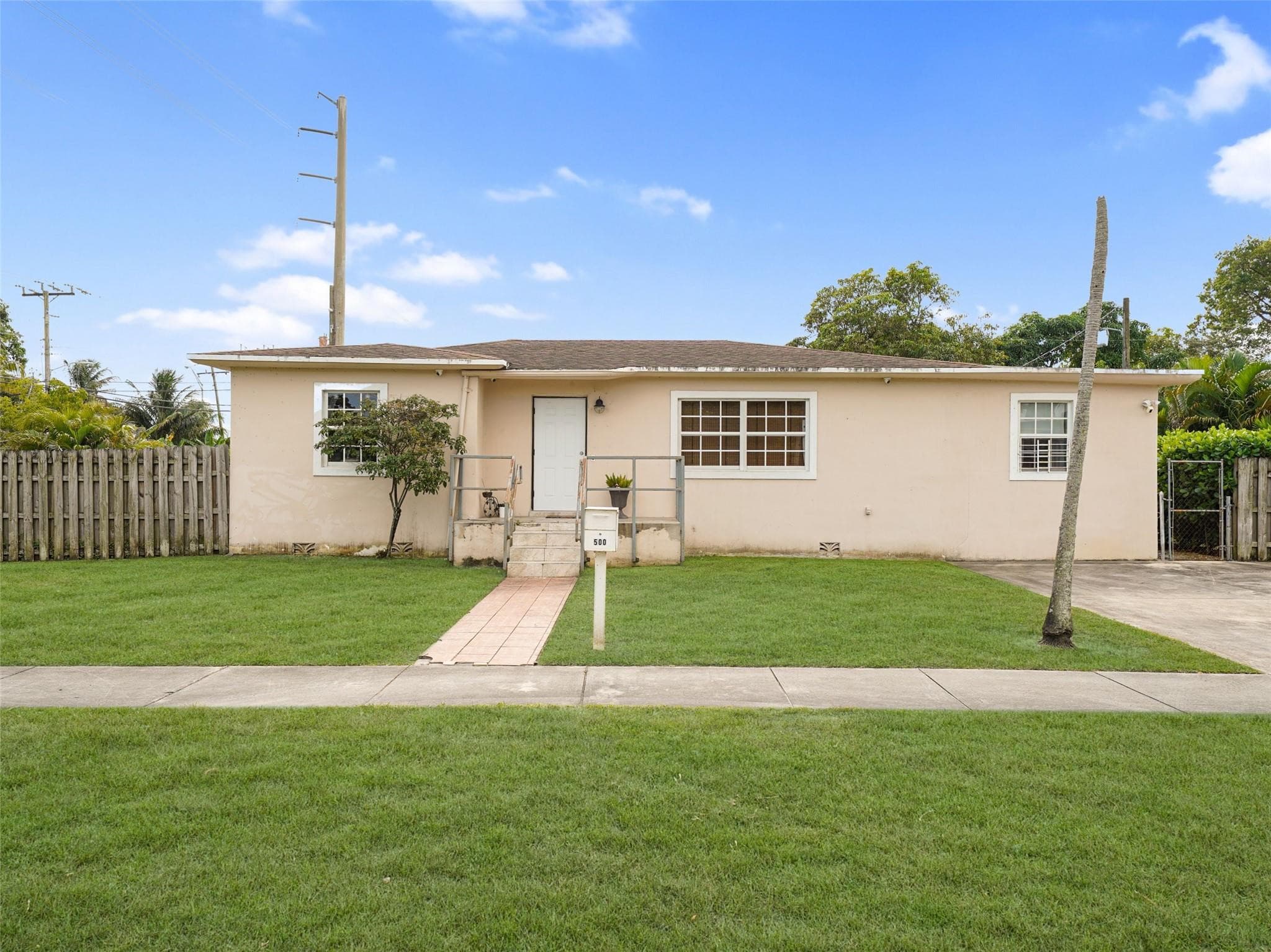 500 NW 120th Street, Miami, FL 33168 — photo 1 of 54