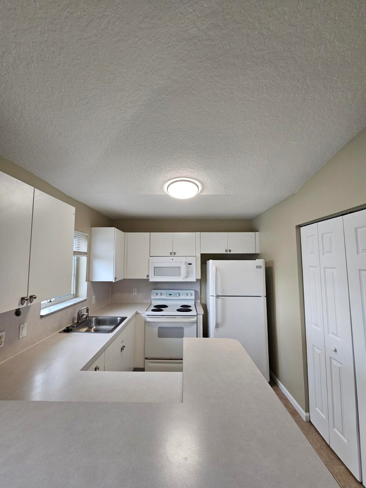 3490 Briar Bay Boulevard 206, West Palm Beach, FL 33411 — photo 12 of 25