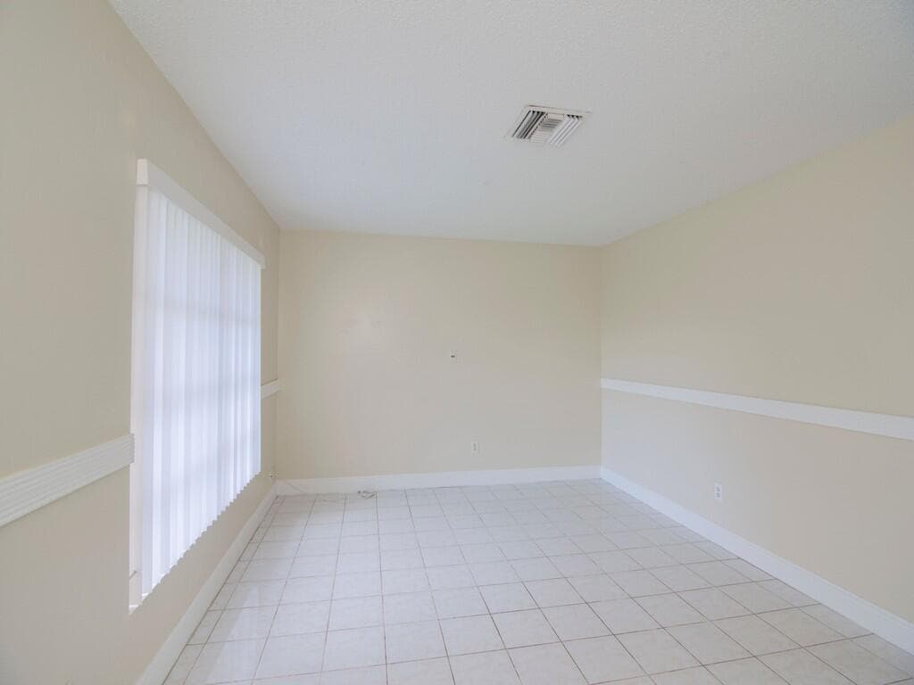 650 SE Evergreen Terrace, FL 34983 — photo 11 of 44
