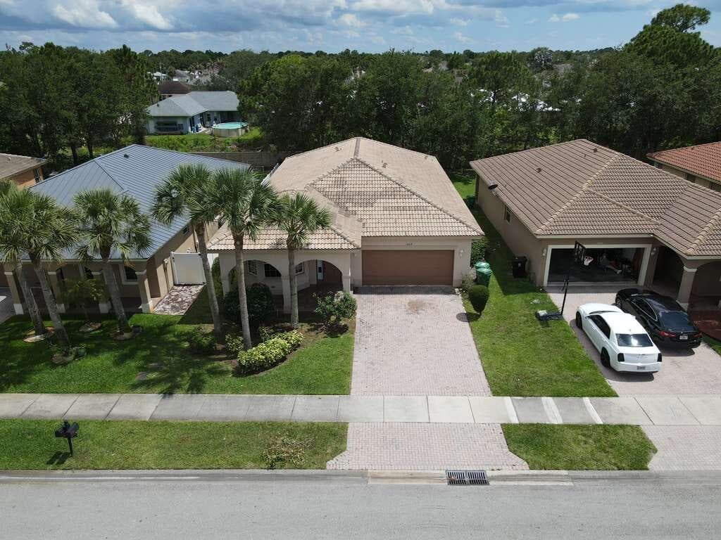 1804 SW Jamesport Drive, Port St. Lucie, FL 34953 — photo 1 of 50