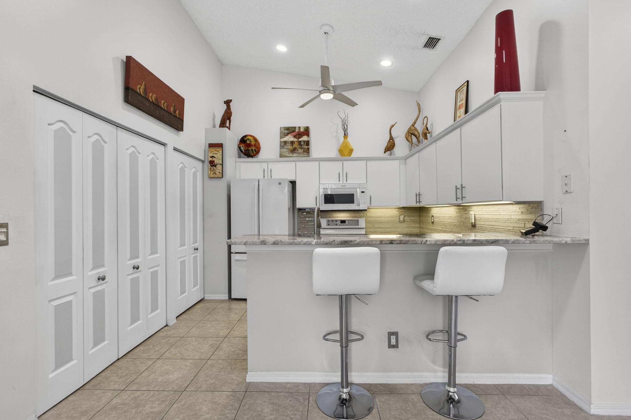 9461 Bridgeport Drive, West Palm Beach, FL 33411 — photo 10 of 67