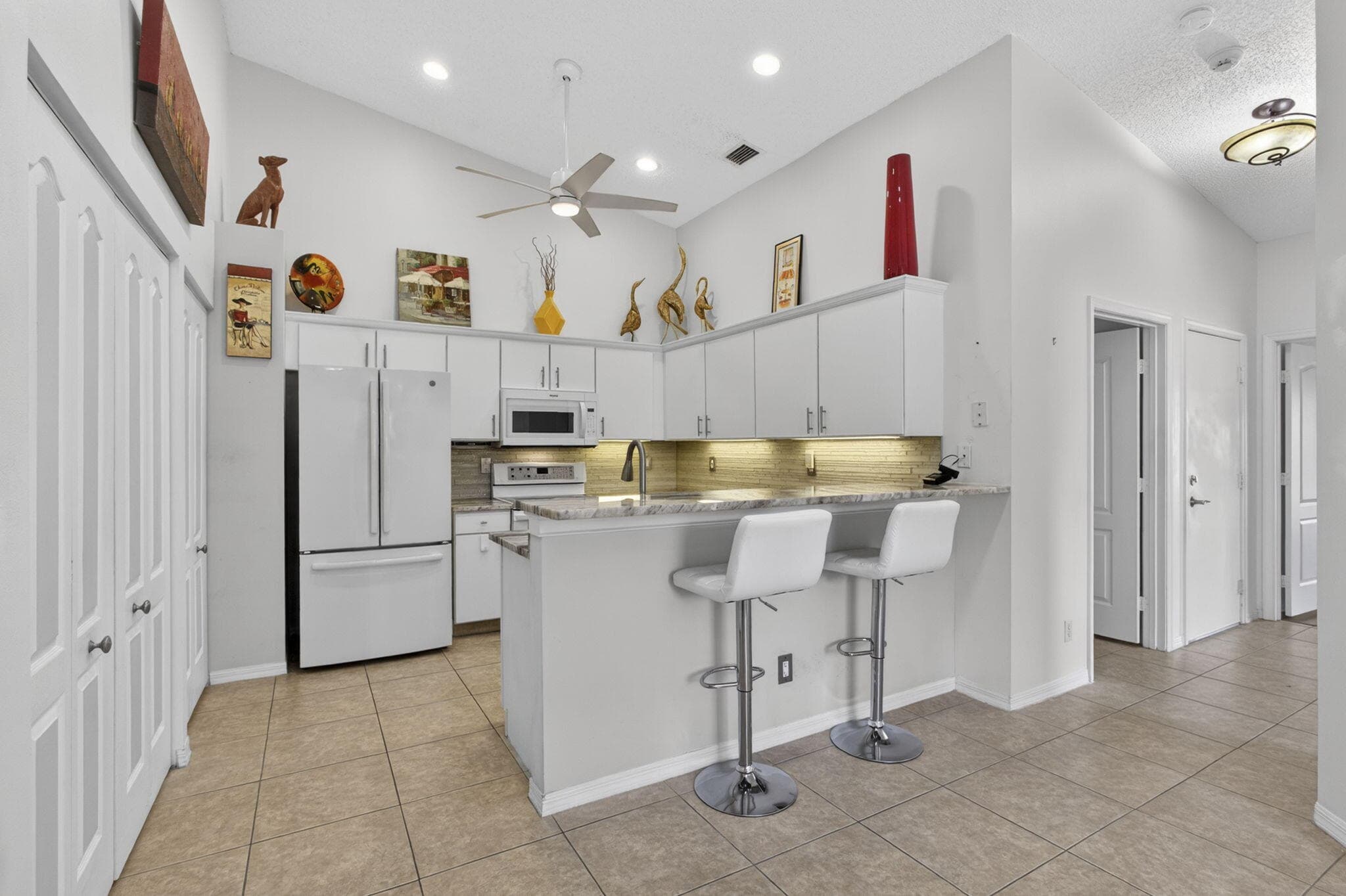 9461 Bridgeport Drive, West Palm Beach, FL 33411 — photo 2 of 67