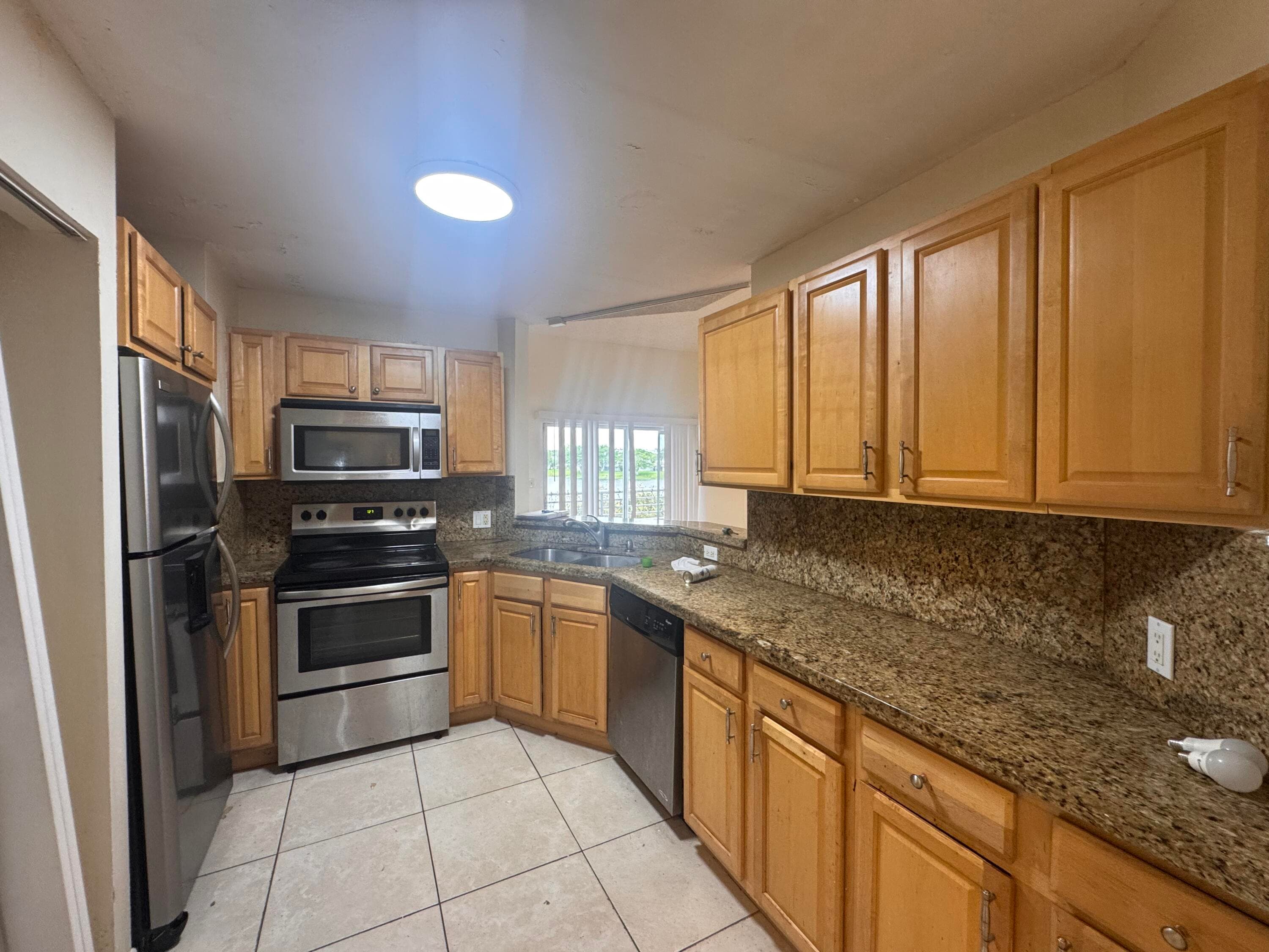 3409 NW 44th Street 205, Lauderdale Lakes, FL 33309 — photo 1 of 18