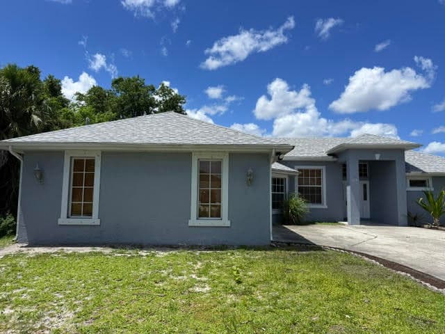 1319 SW Granville Avenue, Port St. Lucie, FL 34953 — photo 2 of 36