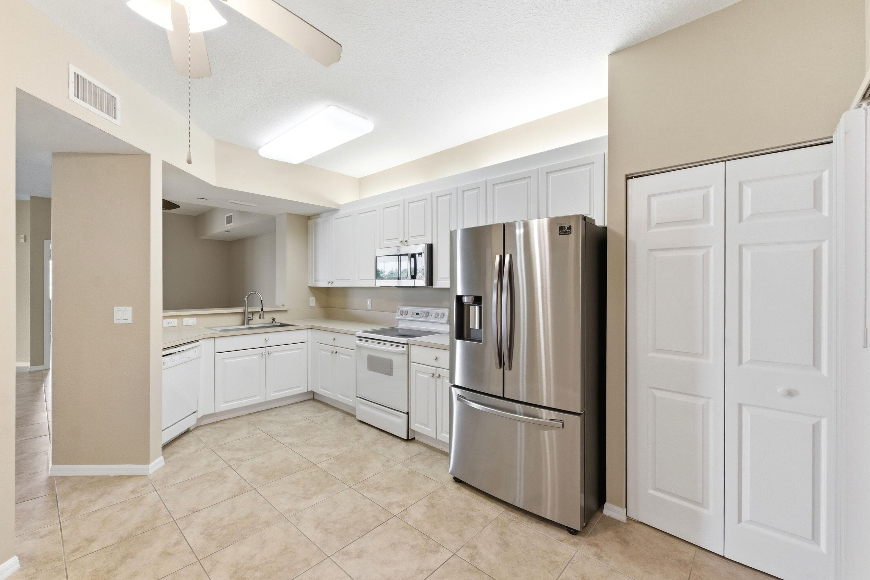 7765 Yardley Drive 107, Tamarac, FL 33321 — photo 1 of 38