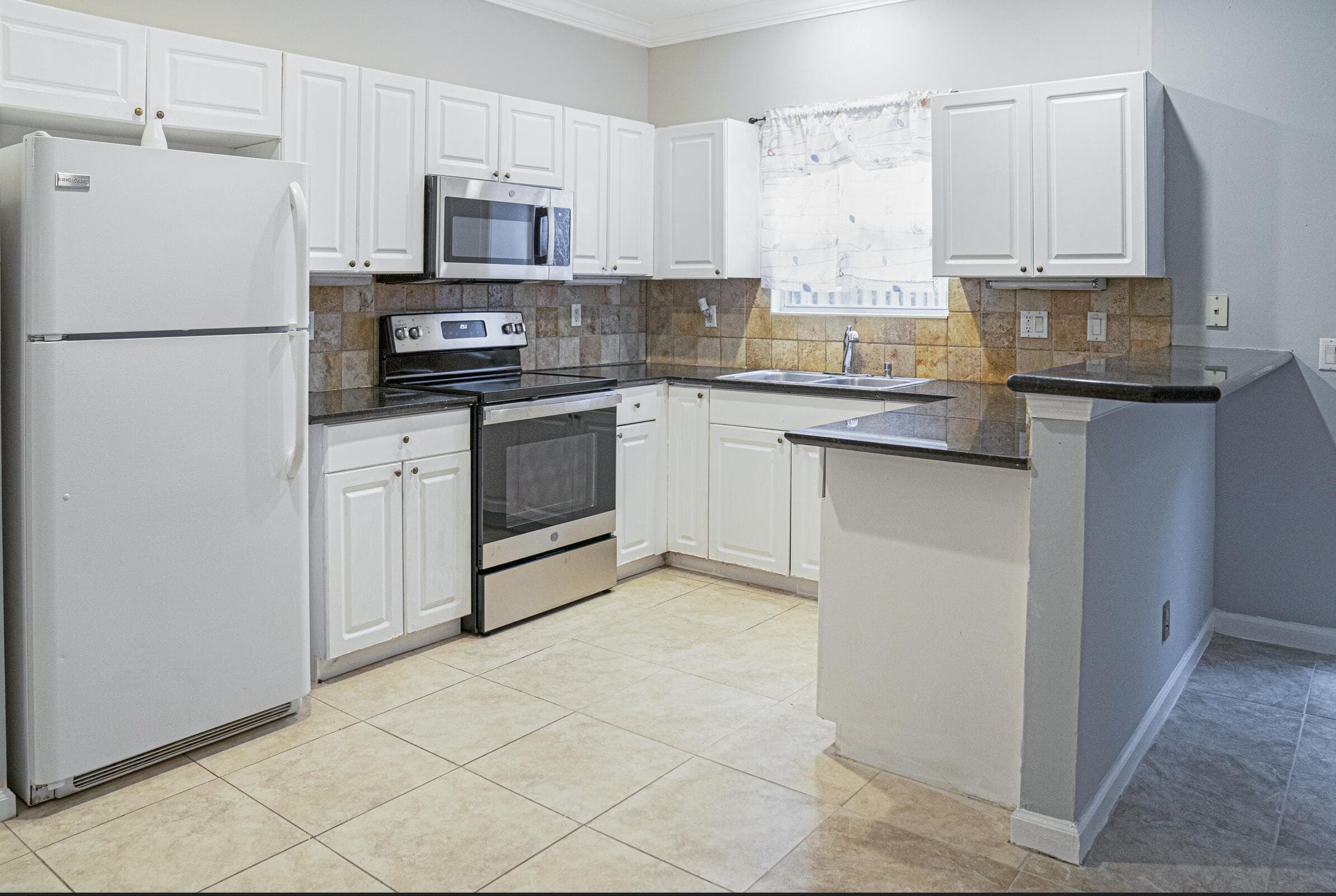 130 Baldwin Boulevard, Greenacres, FL 33463 — photo 5 of 19