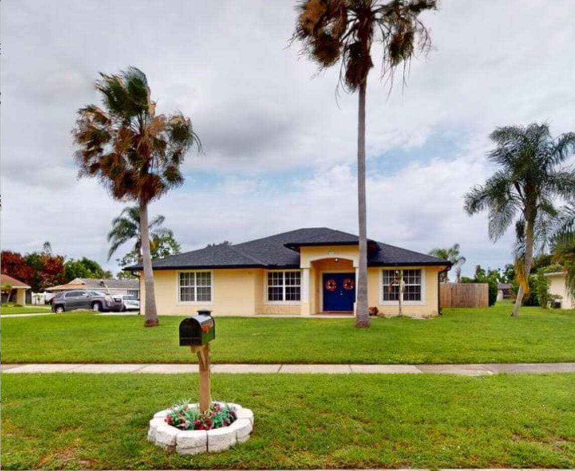 201 NE Faring Avenue, Port St. Lucie, FL 34983 — photo 1 of 37