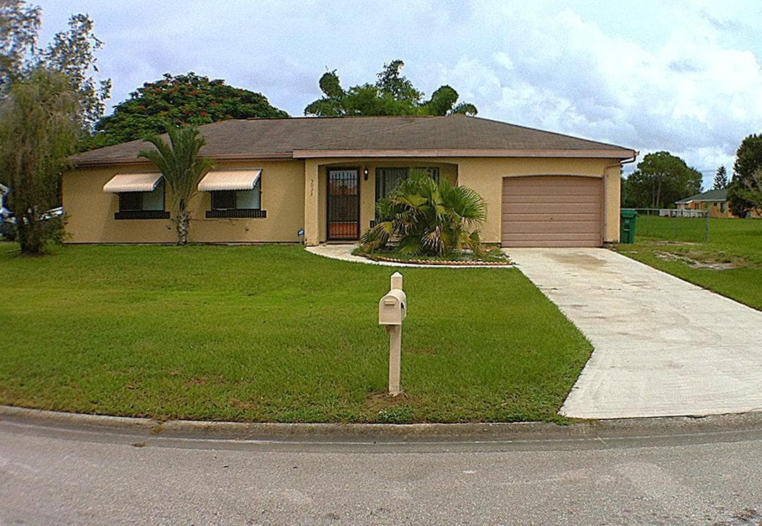 3033 SW Denton Street, Port St. Lucie, FL 34953 — photo 1 of 20