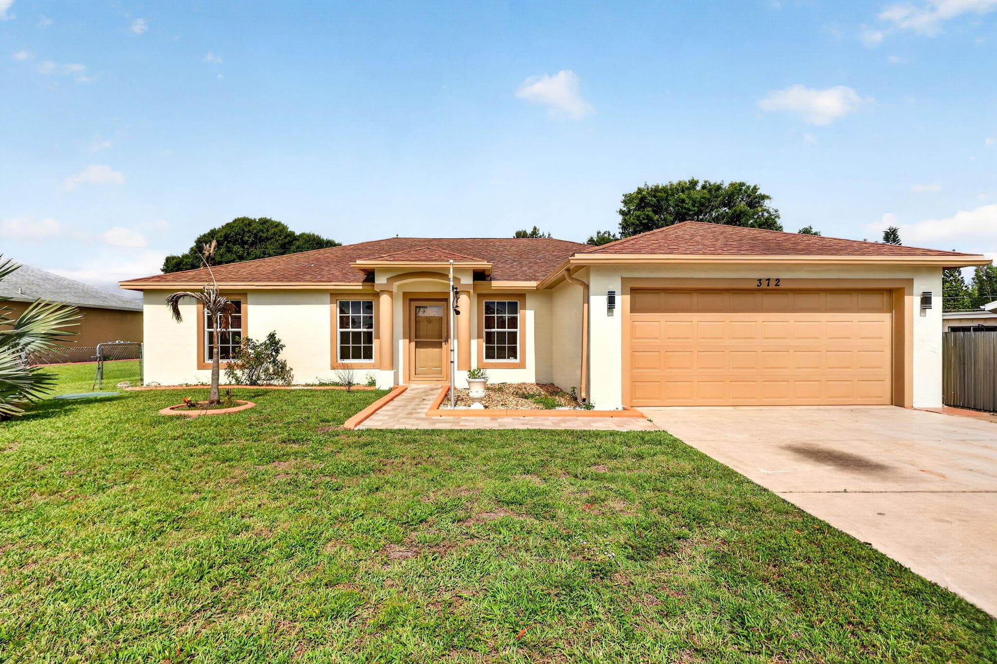 372 NW Hogan Street, FL 34983 — photo 1 of 32
