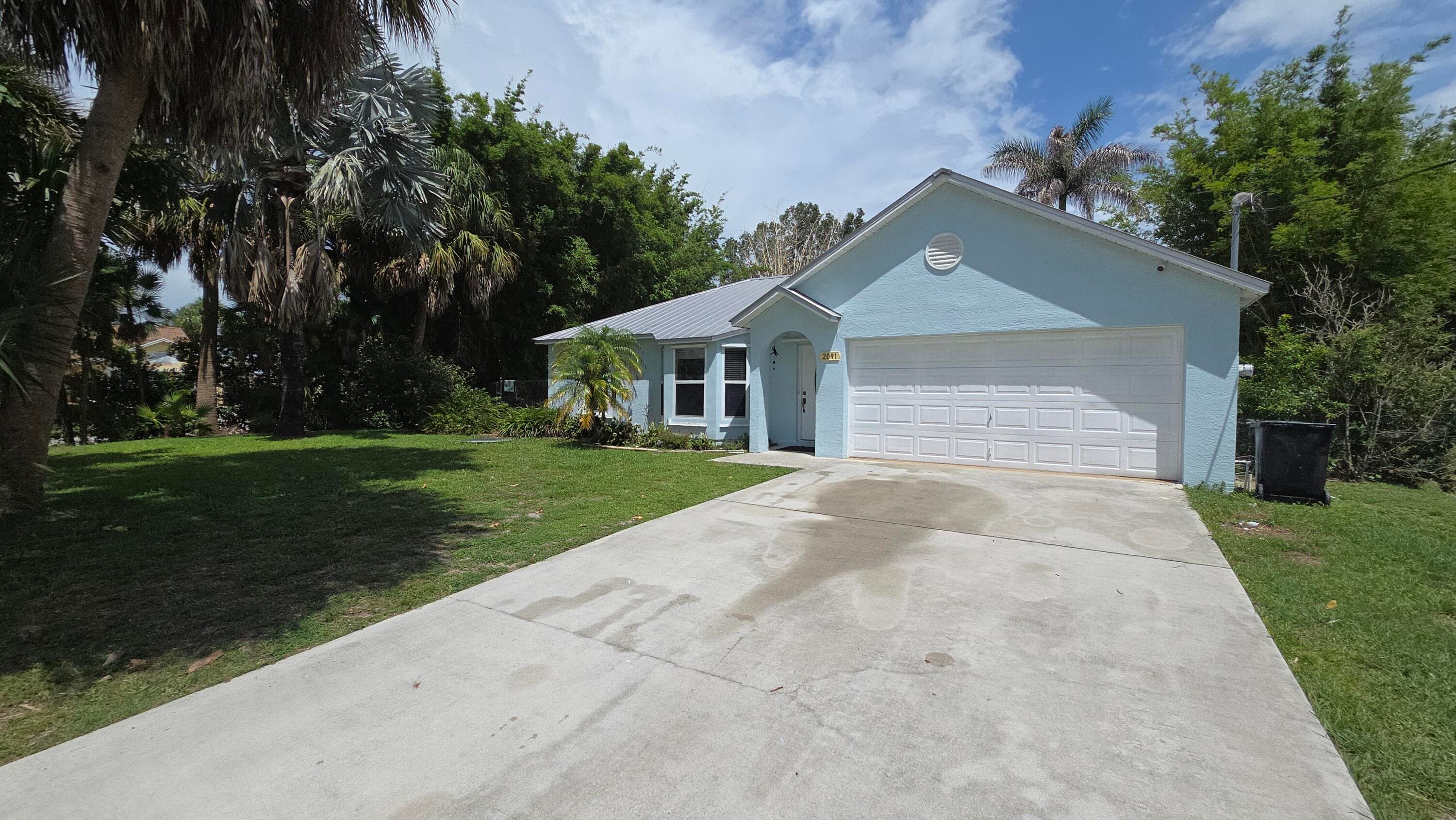 2091 SW Villanova Road, Port St. Lucie, FL 34953 — photo 1 of 20