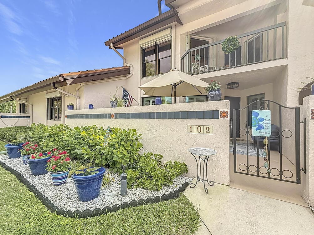 3410 SE Martinique Trace 102, Stuart, FL 34997 — photo 1 of 32