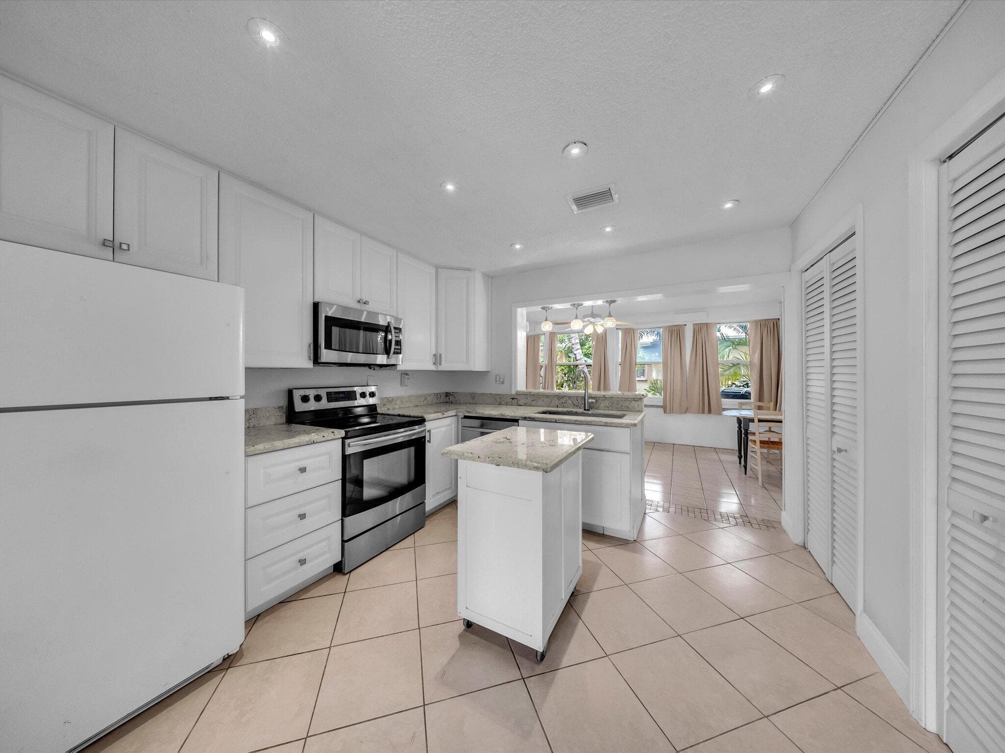 4935 NW 54th Street, Tamarac, FL 33319 — photo 9 of 28