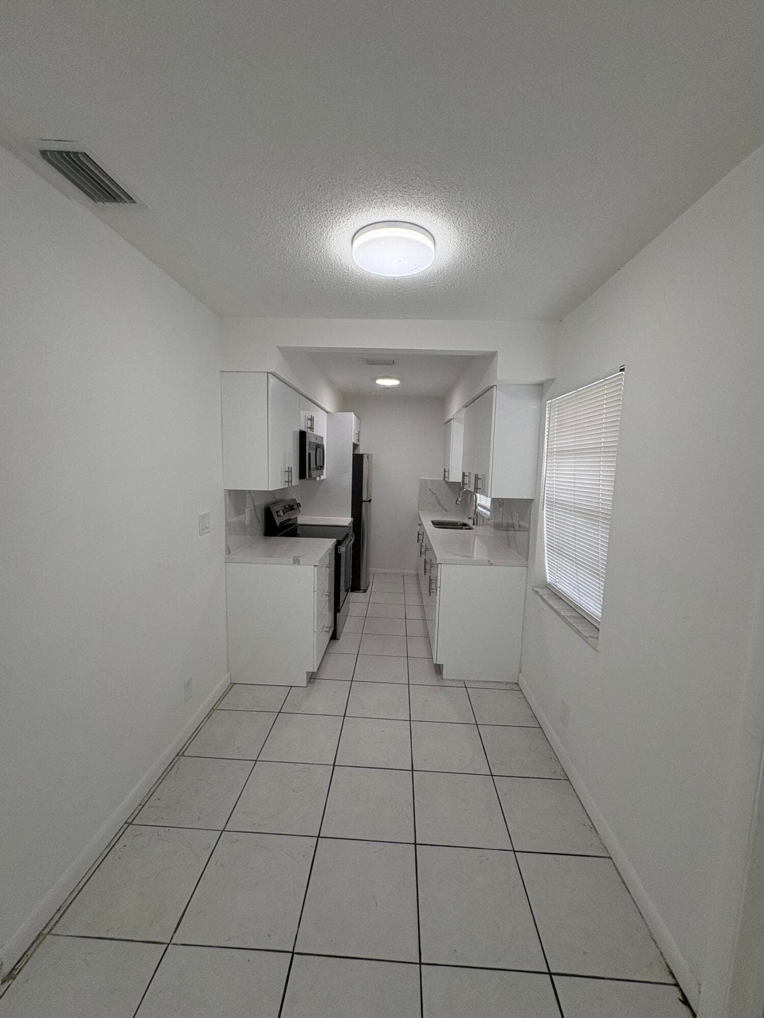 4031 NW 30th Terrace 1, Lauderdale Lakes, FL 33309 — photo 4 of 12