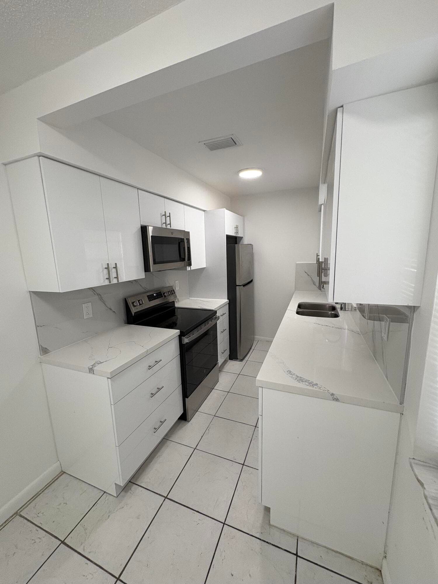 4031 NW 30th Terrace 1, Lauderdale Lakes, FL 33309 — photo 1 of 12