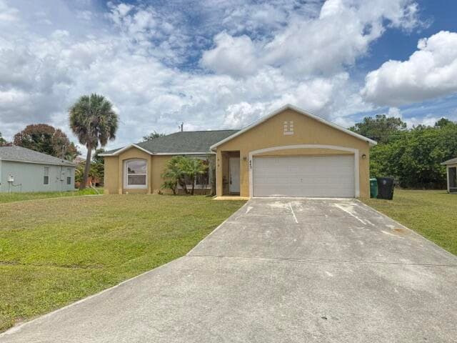 443 SW Sadwick Avenue, Port St. Lucie, FL 34953 — photo 1 of 8