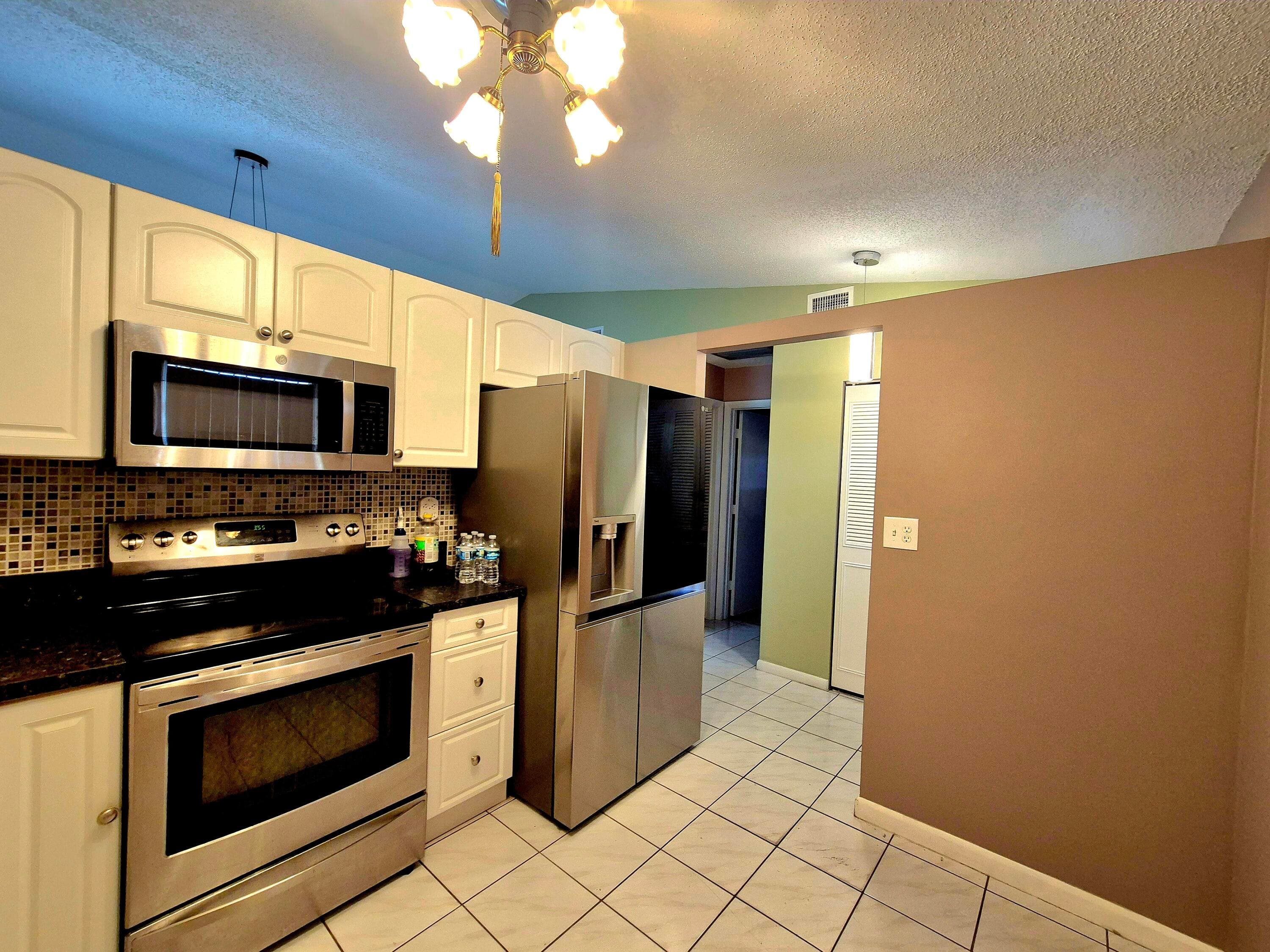 540 NW 43rd Street, Deerfield Beach, FL 33064 — photo 8 of 37