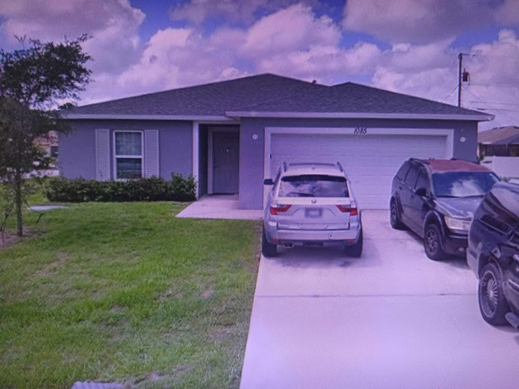 1085 SW Firestone Avenue, Port St. Lucie, FL 34953 — photo 1 of 2