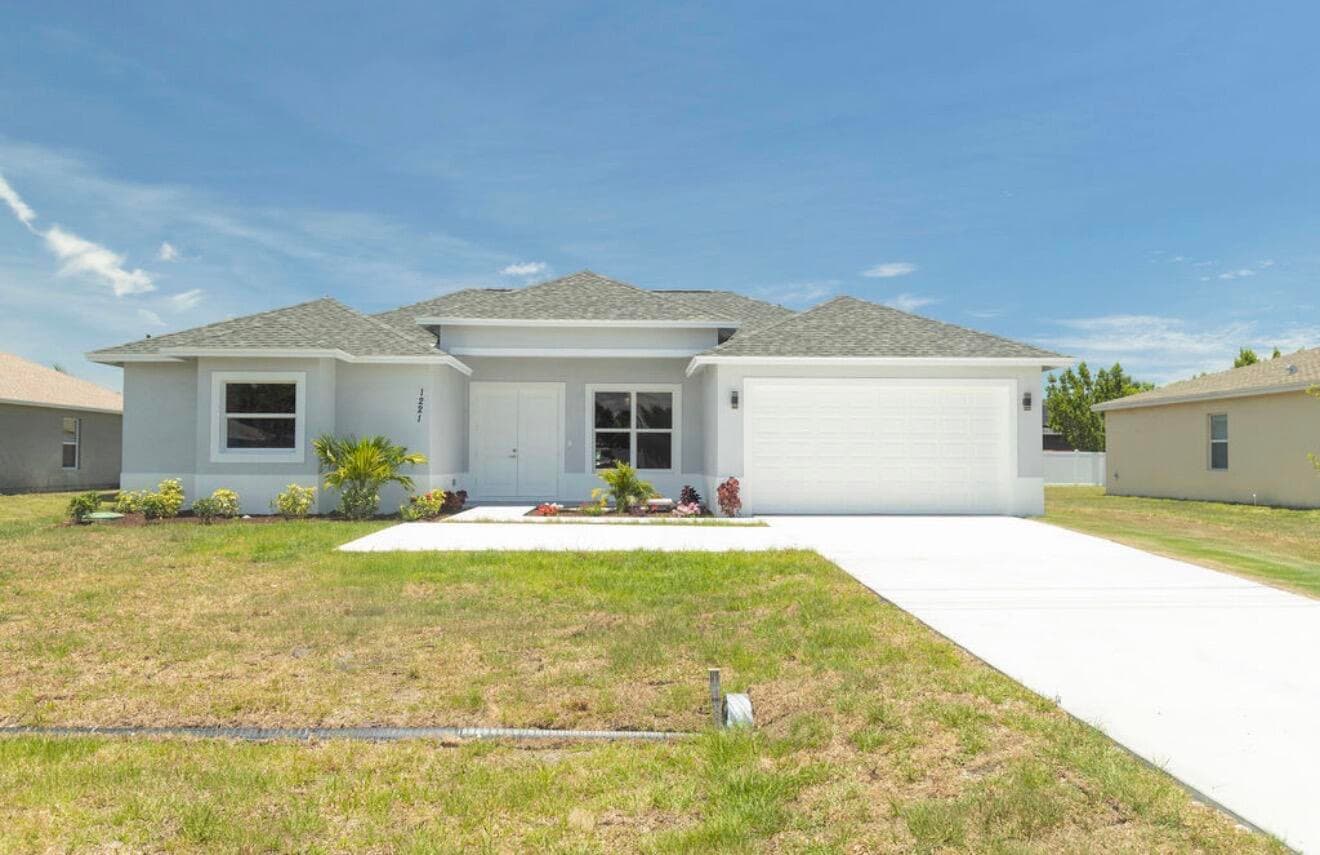 1221 SW Alcantarra Boulevard, Port St. Lucie, FL 34953 — photo 1 of 32