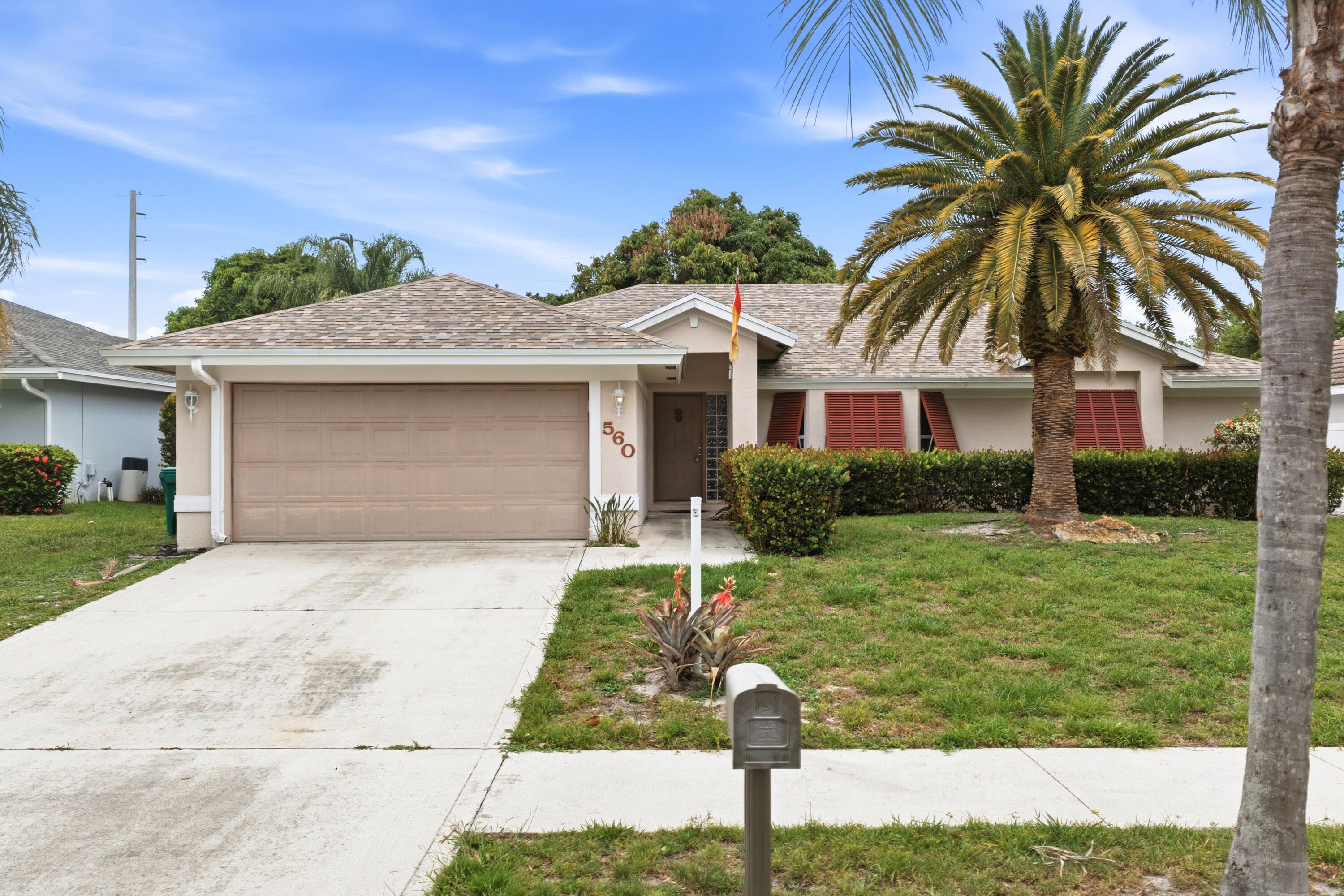560 N Cypress Drive, Jupiter, FL 33469 — photo 1 of 10