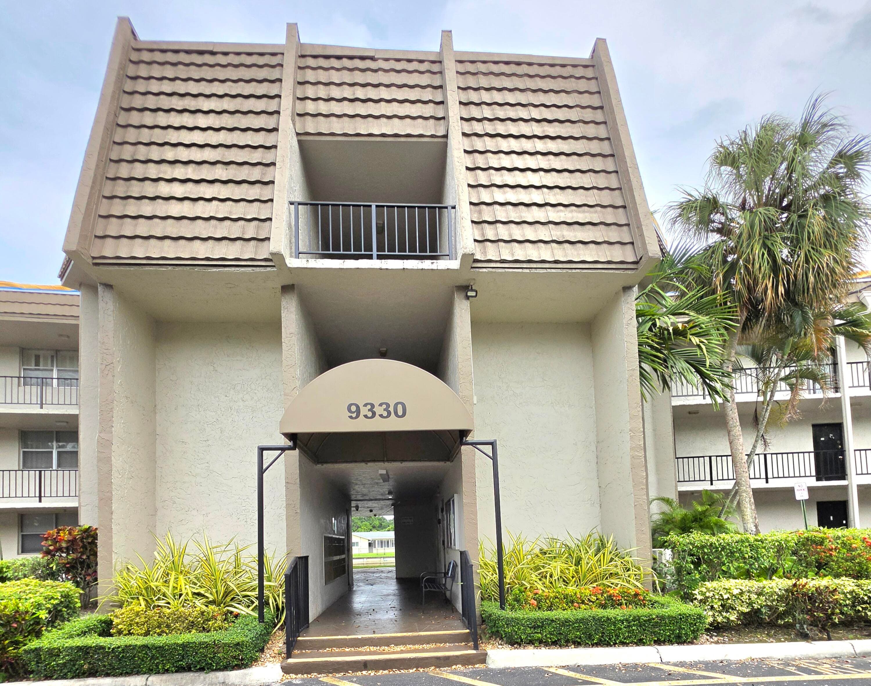 9330 Lime Bay Boulevard 301, Tamarac, FL 33321 — photo 2 of 40