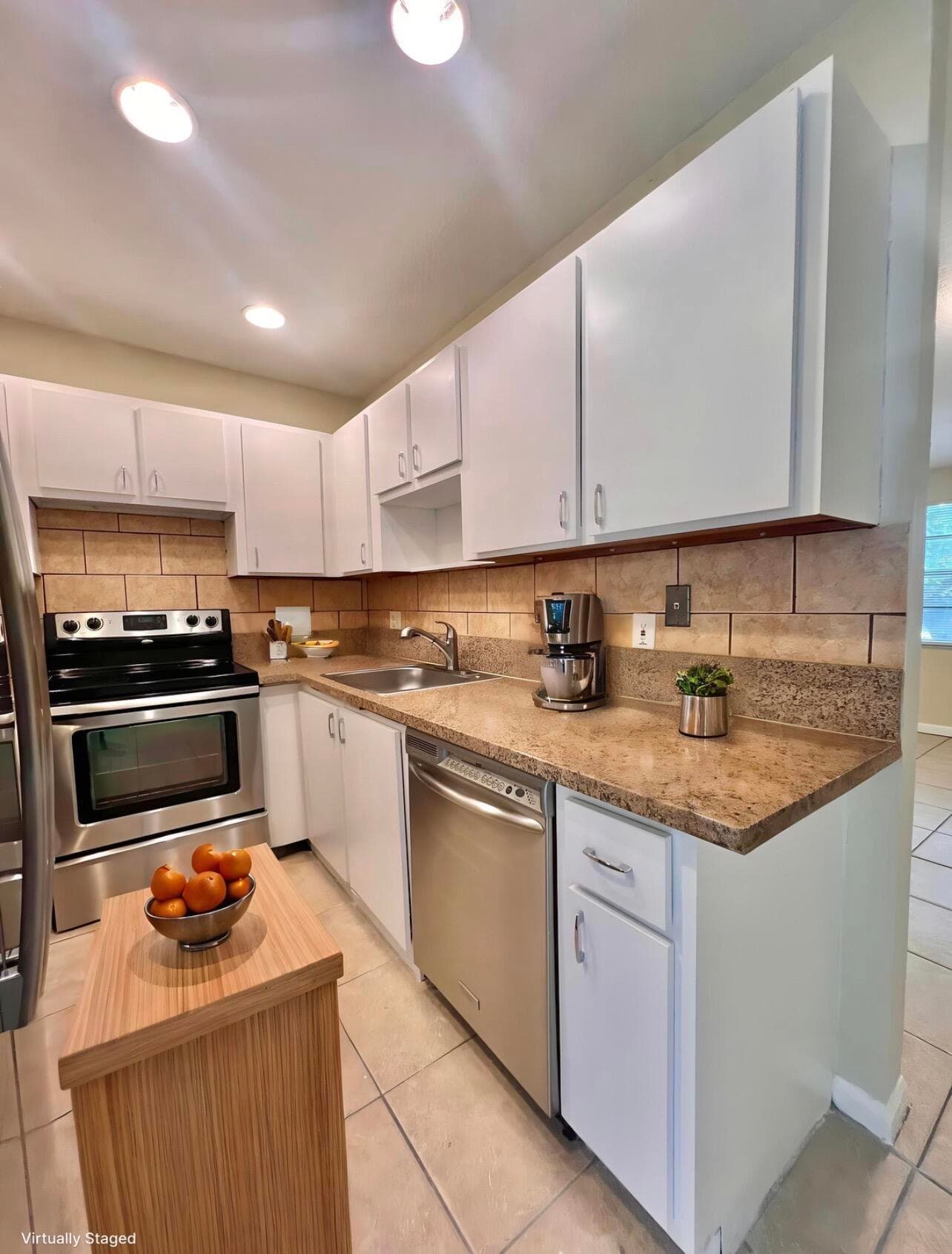 423 Glenwood Drive, West Palm Beach, FL 33415 — photo 1 of 24