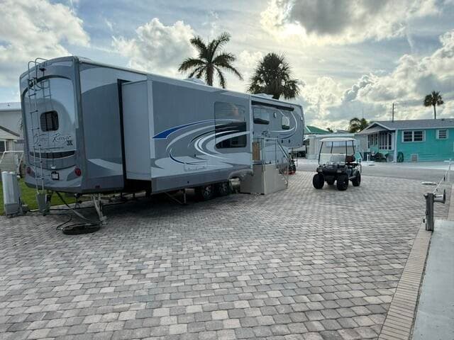 883 Nettles Boulevard, Jensen Beach, FL 34957 — photo 1 of 11