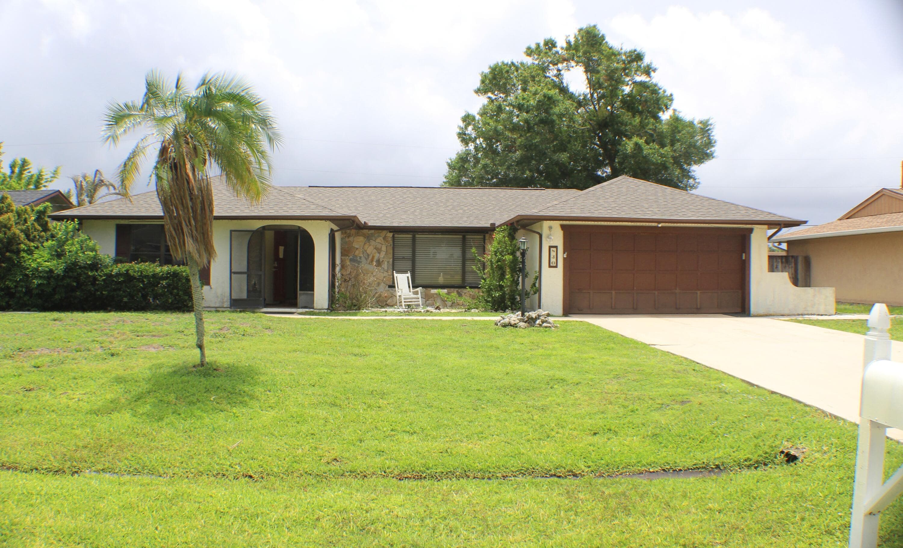 830 SE Evergreen Terrace, Port St. Lucie, FL 34983 — photo 1 of 8
