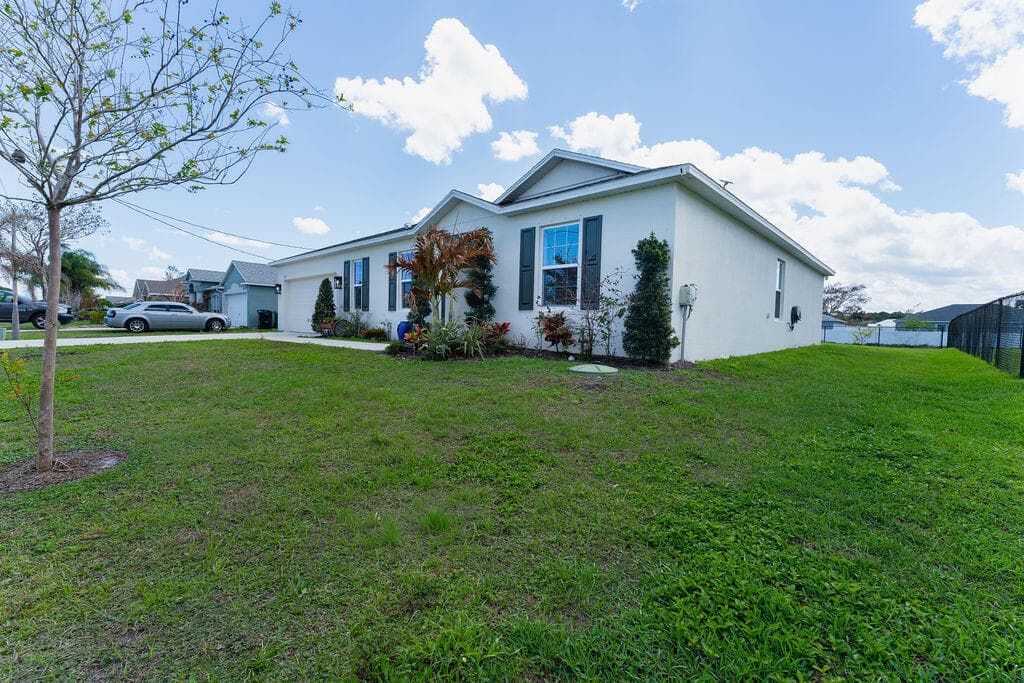 138 SW Carter Avenue, Port St. Lucie, FL 34983 — photo 2 of 56