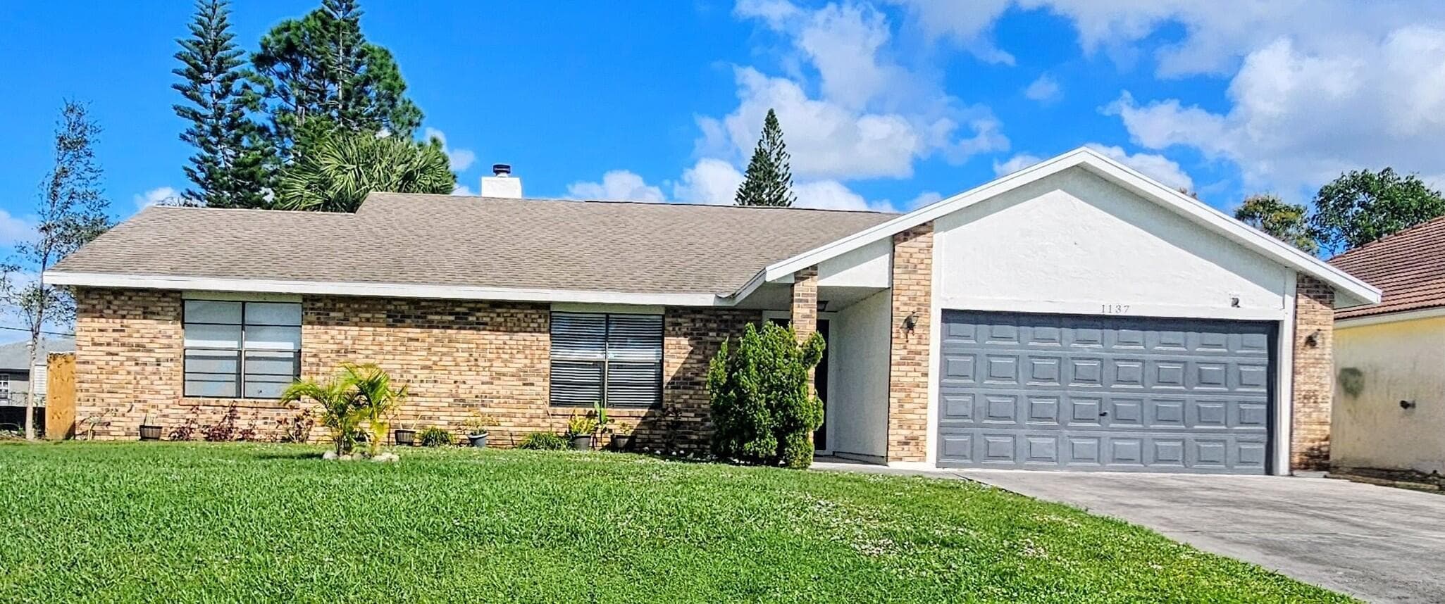 1137 SW Estaugh Avenue, Port St. Lucie, FL 34953 — photo