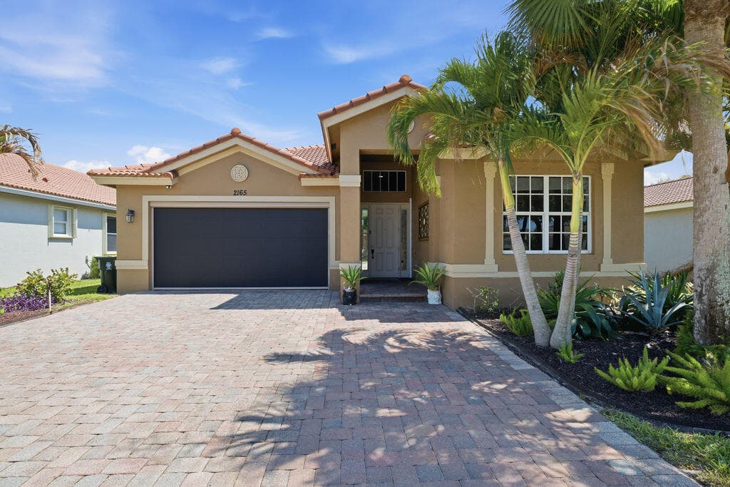 2165 SW Newport Isles Boulevard, Port St. Lucie, FL 34953 — photo 1 of 57