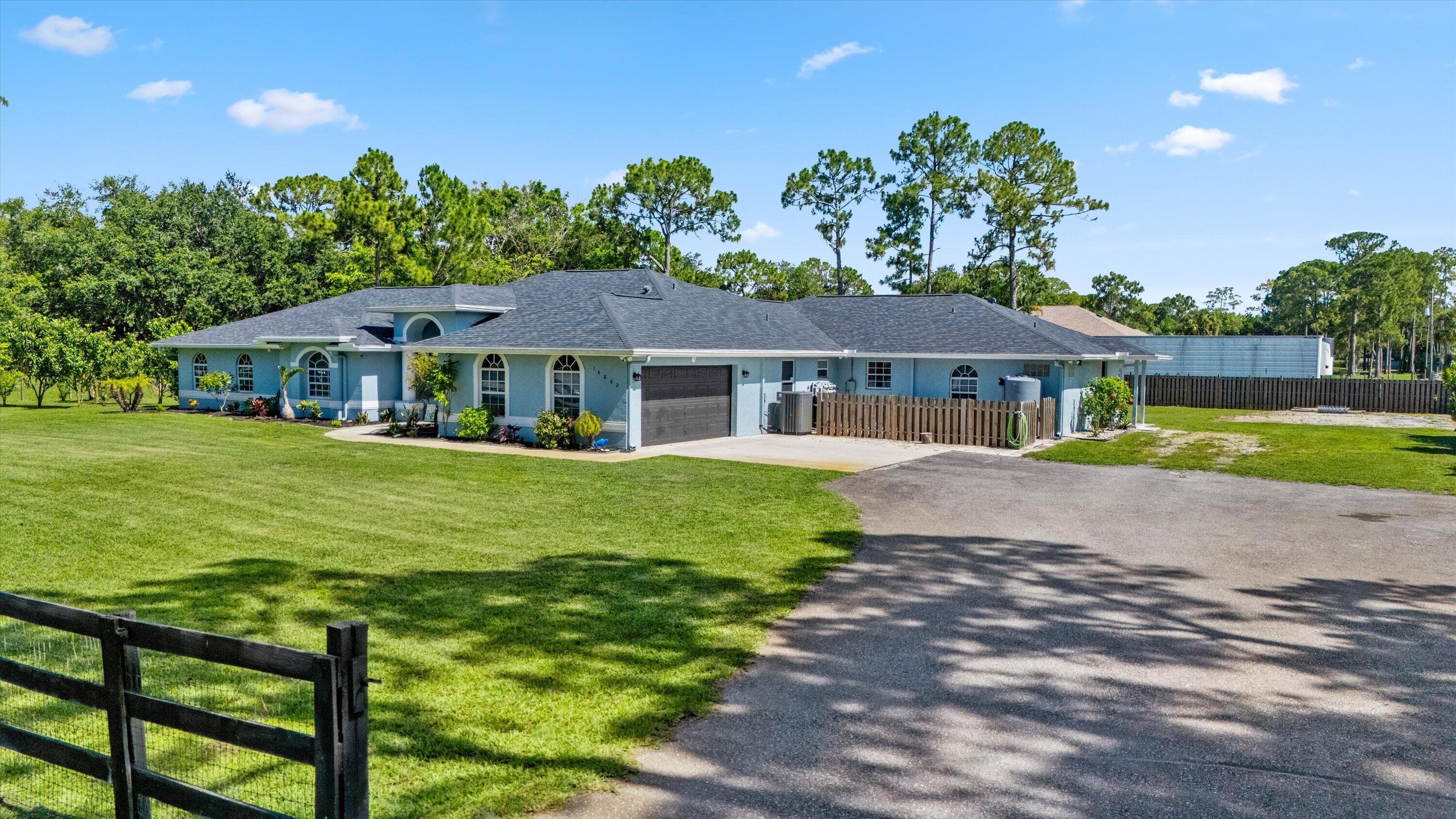 14862 85th Road N, The Acreage, FL 33470 — photo 1 of 49