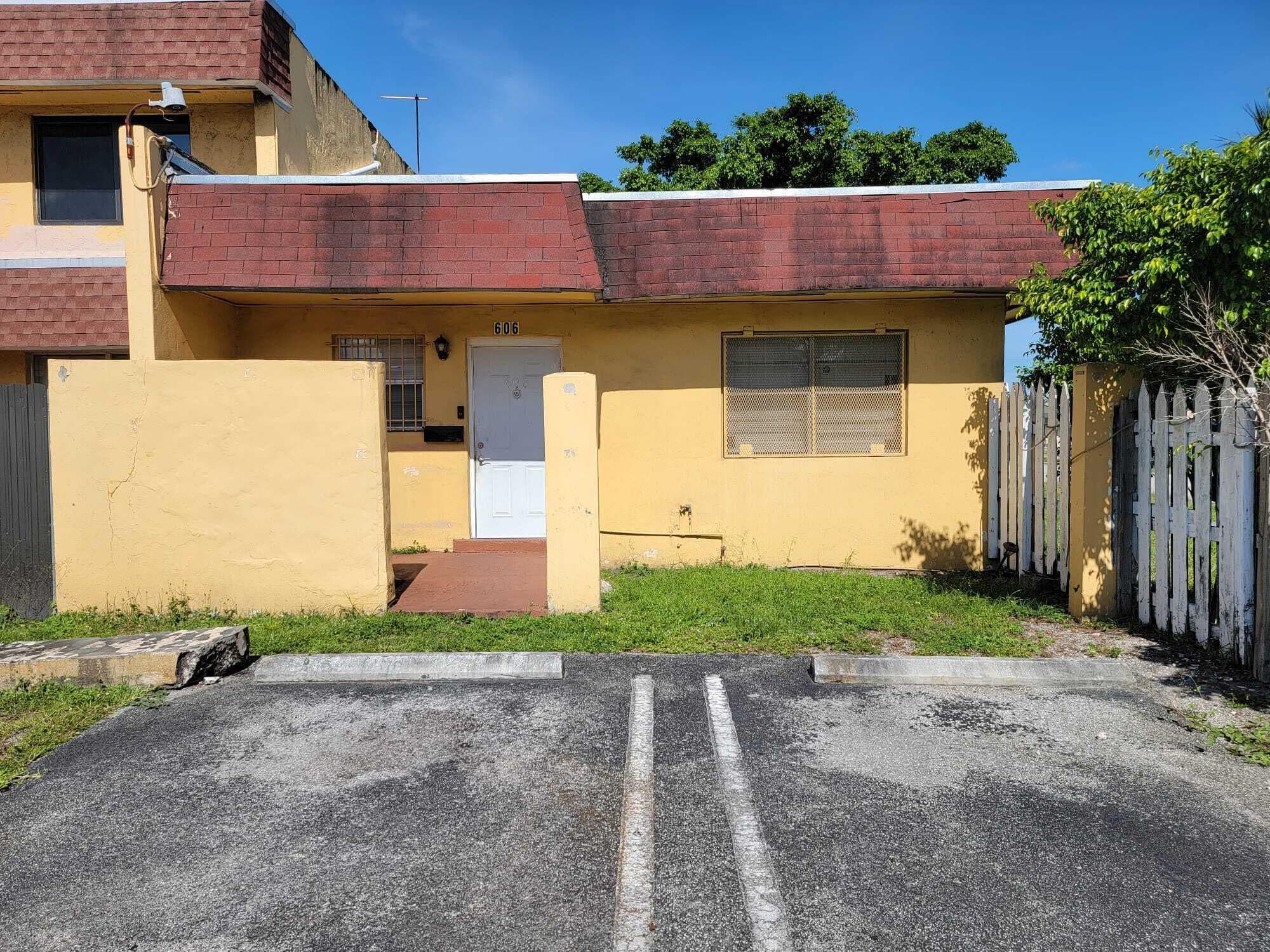 606 NW 179th Street, Miami Gardens, FL 33169 — photo 1 of 11