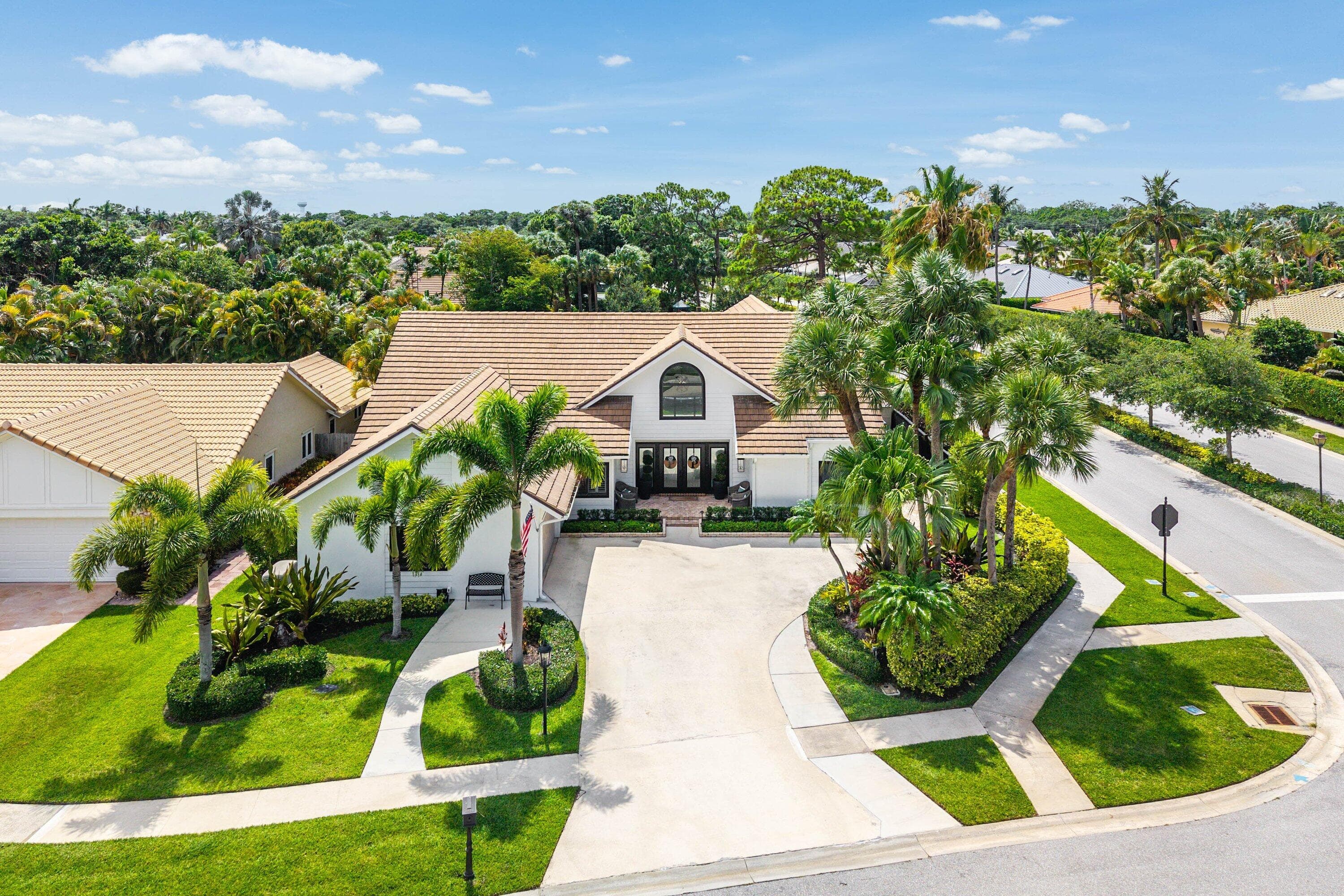 2707 Biarritz Drive, Palm Beach Gardens, FL 33410 — photo 1 of 80