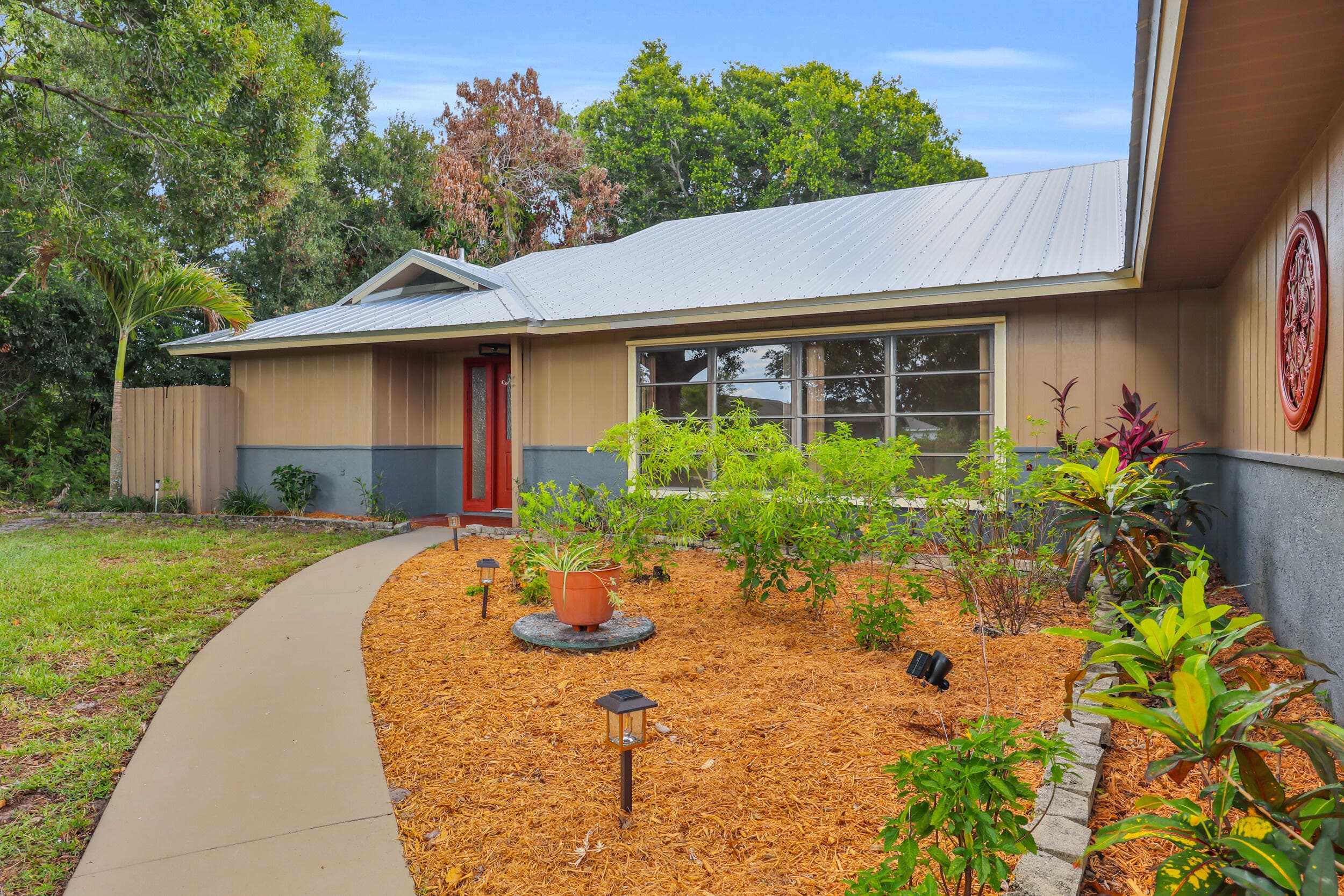 2311 SE Bowie Street, FL 34952 — photo 3 of 68