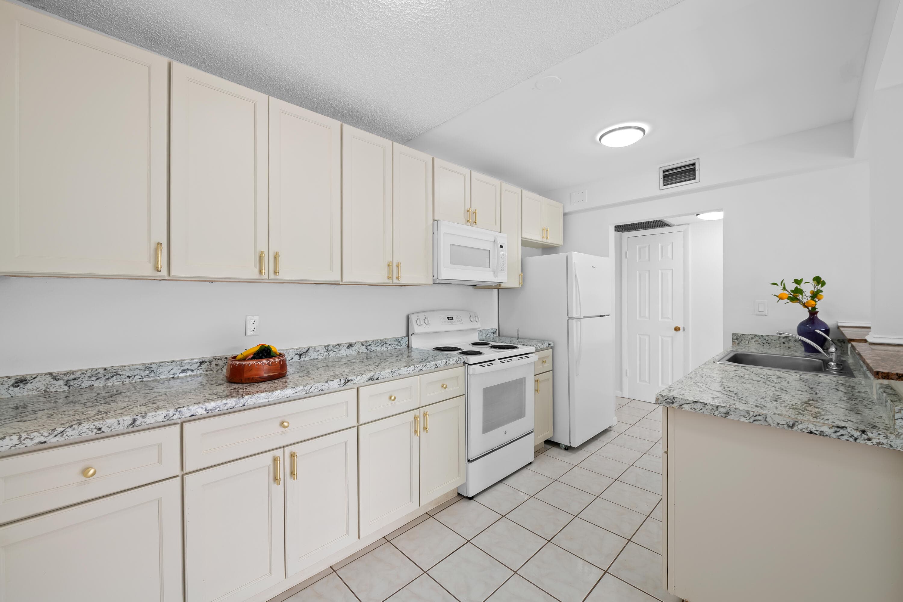 5190 E Sabal Palm Boulevard 209, Tamarac, FL 33319 — photo 1 of 32