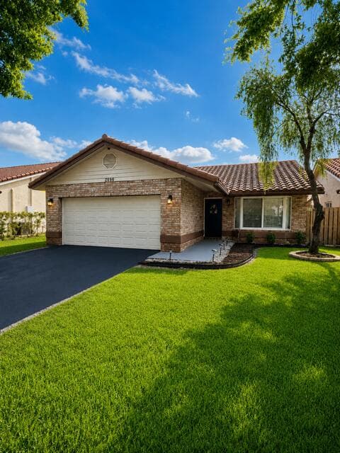 2696 NW 94th Avenue, Coral Springs, FL 33065 — photo 1 of 26