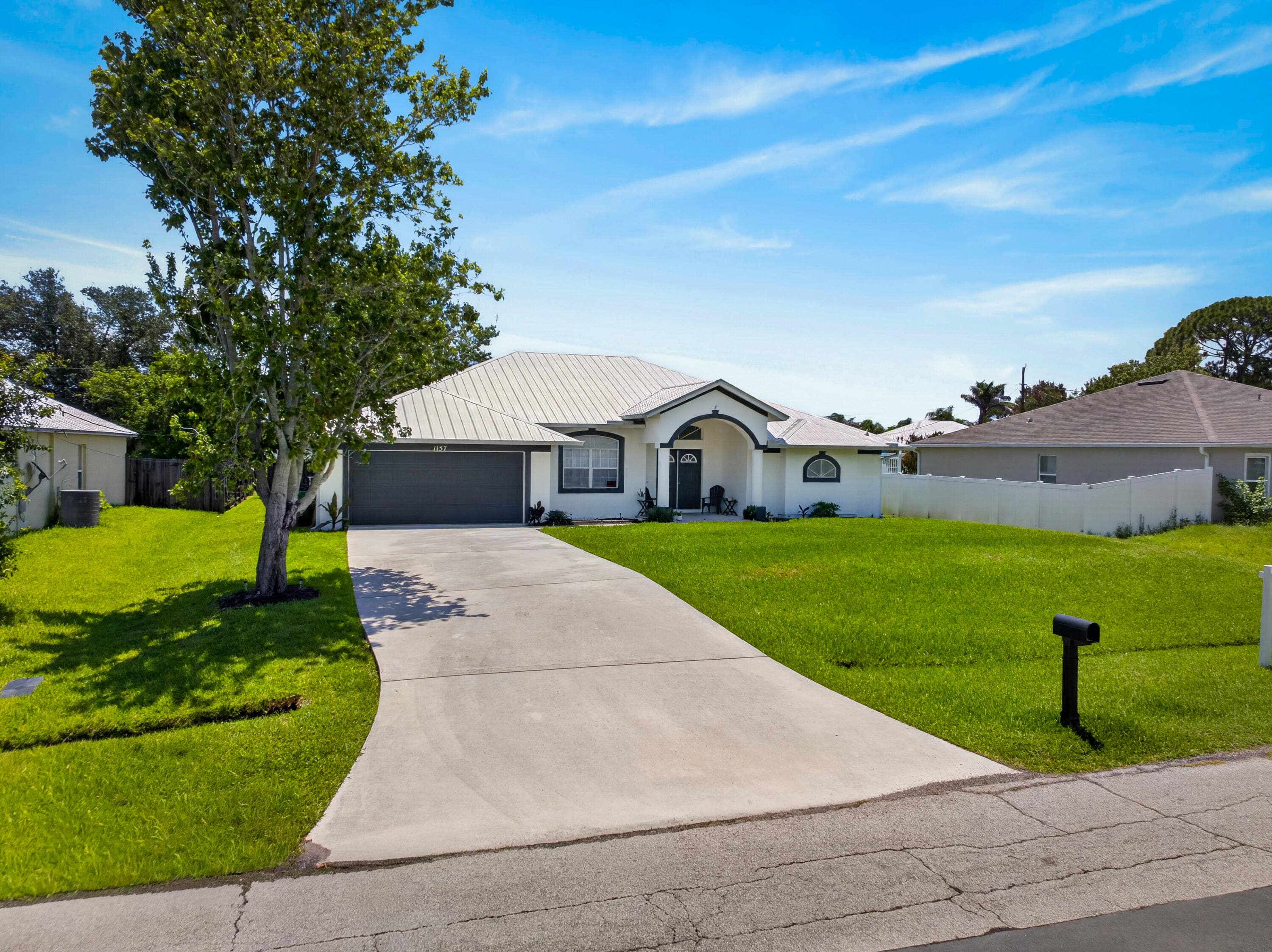 1157 SW Heather Street, Port St. Lucie, FL 34983 — photo 3 of 37