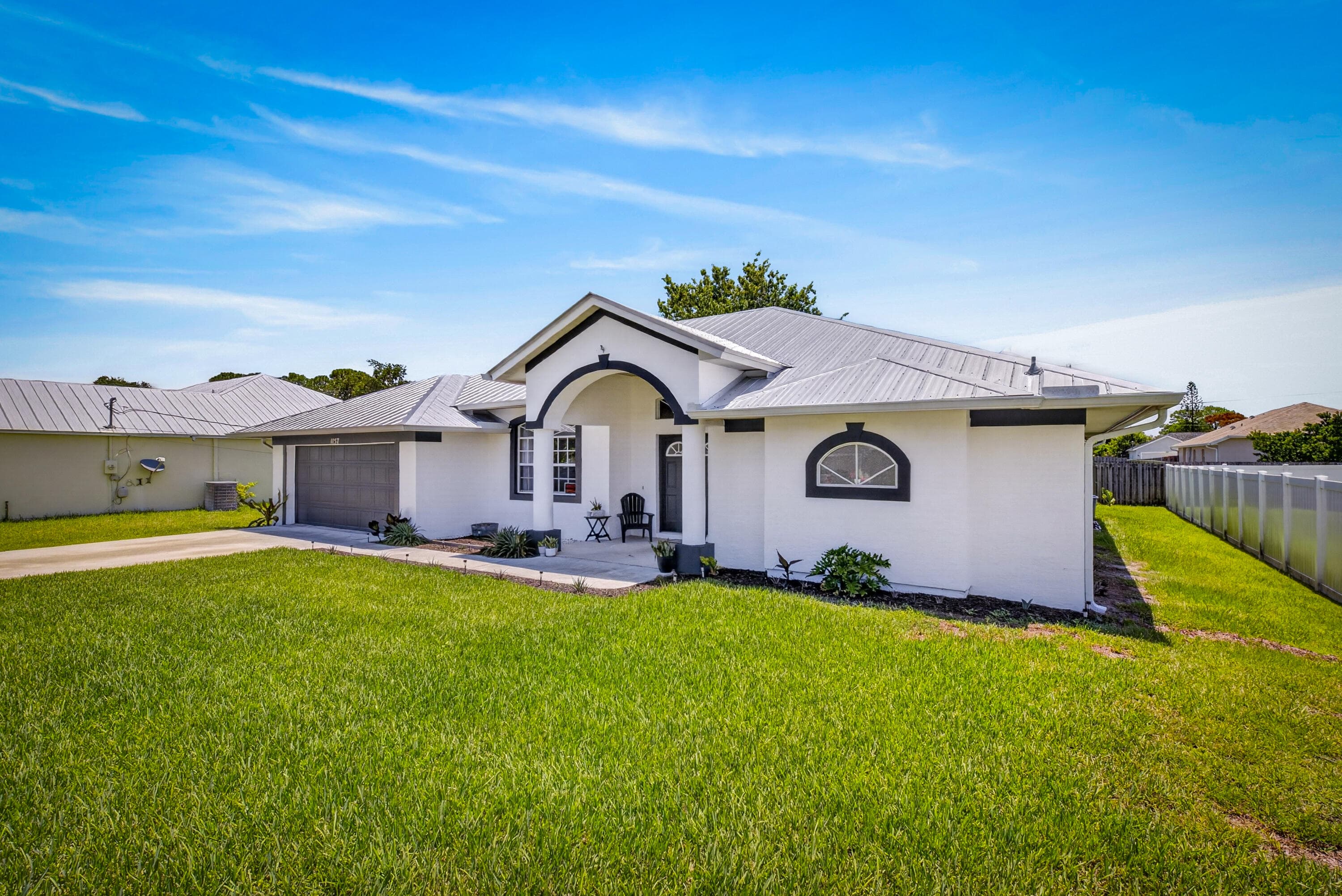 1157 SW Heather Street, Port St. Lucie, FL 34983 — photo 2 of 37