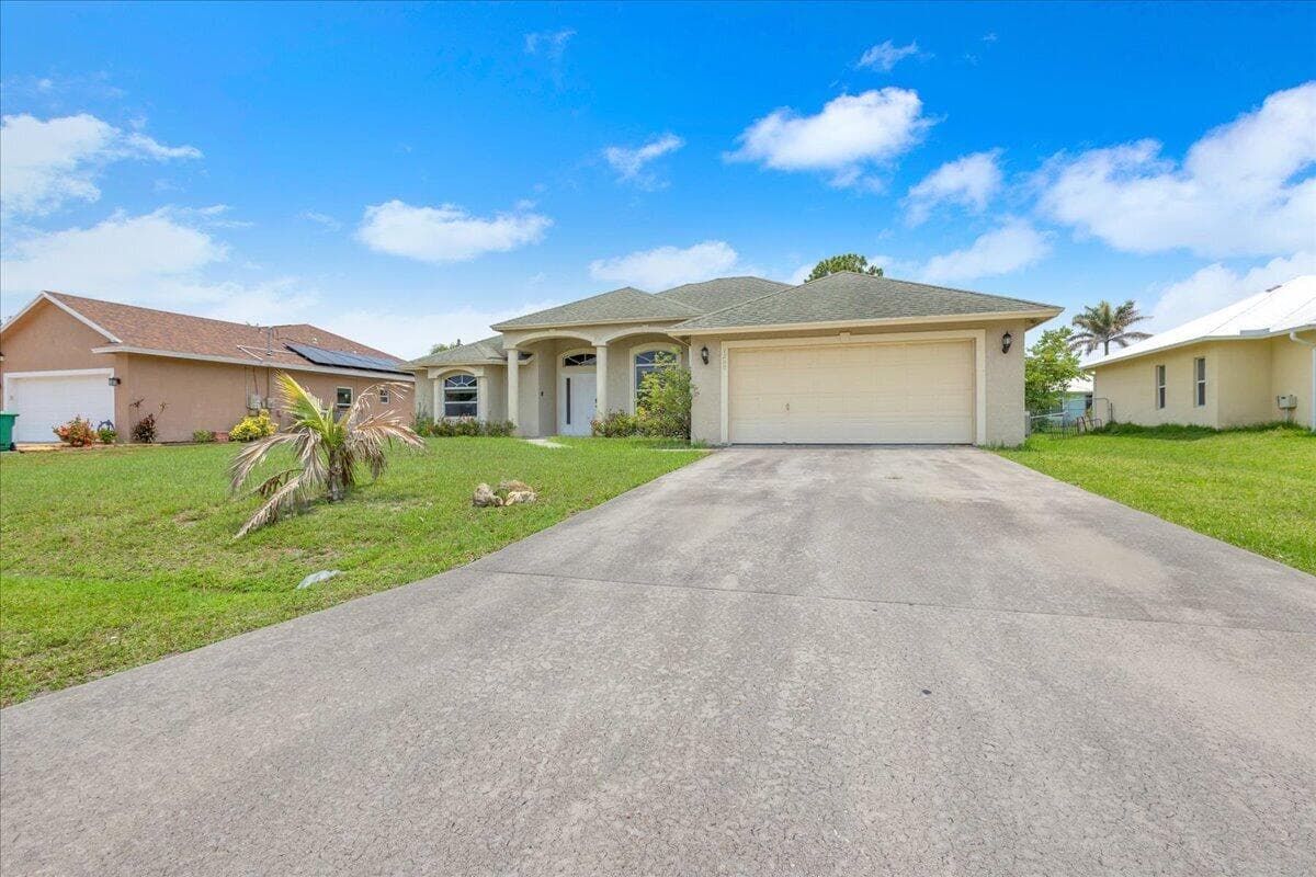 1250 SW Patricia Avenue, Port St. Lucie, FL 34953 — photo 2 of 42