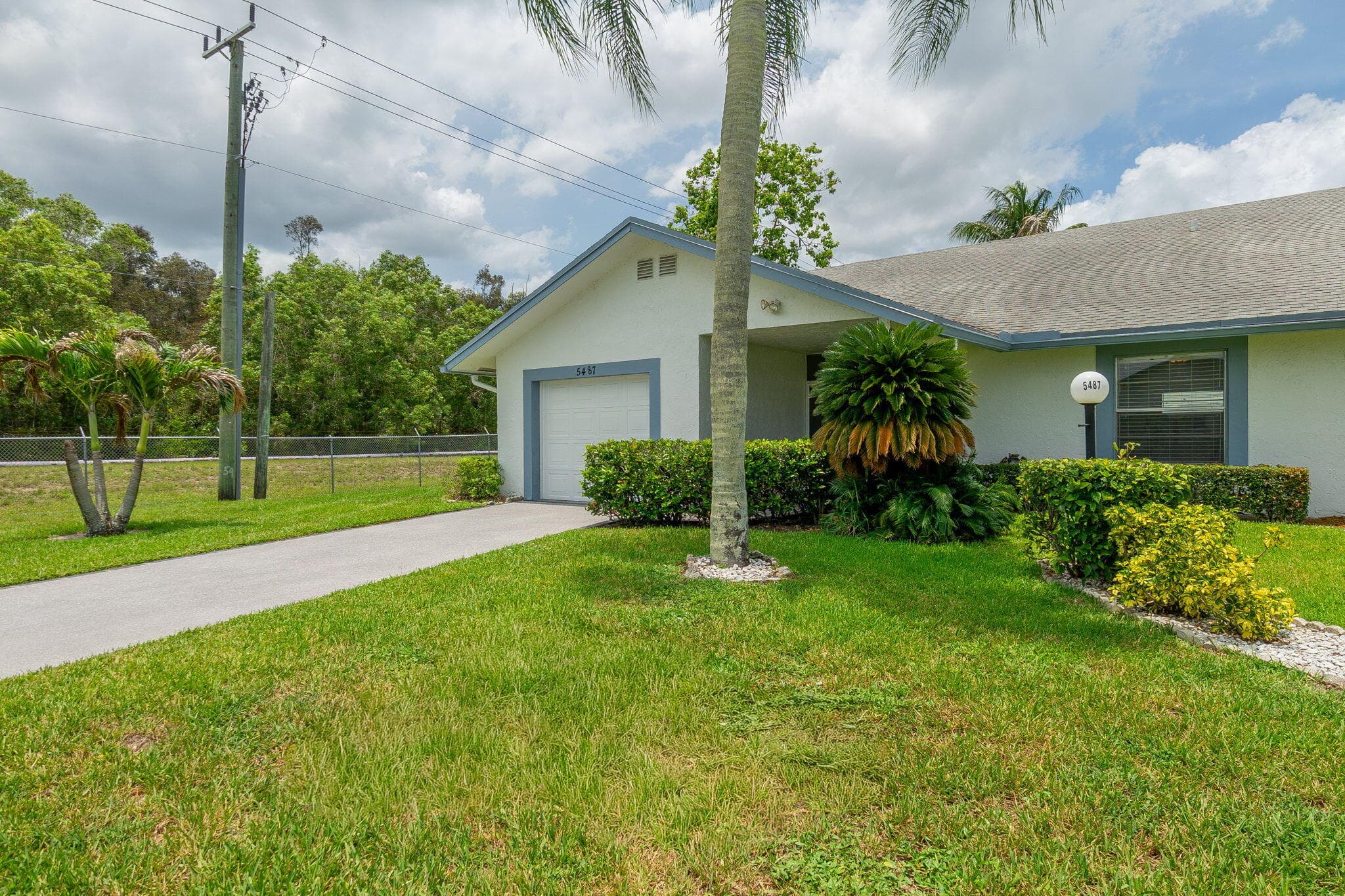 5487 Crystal Anne Drive, West Palm Beach, FL 33417 — photo 2 of 49