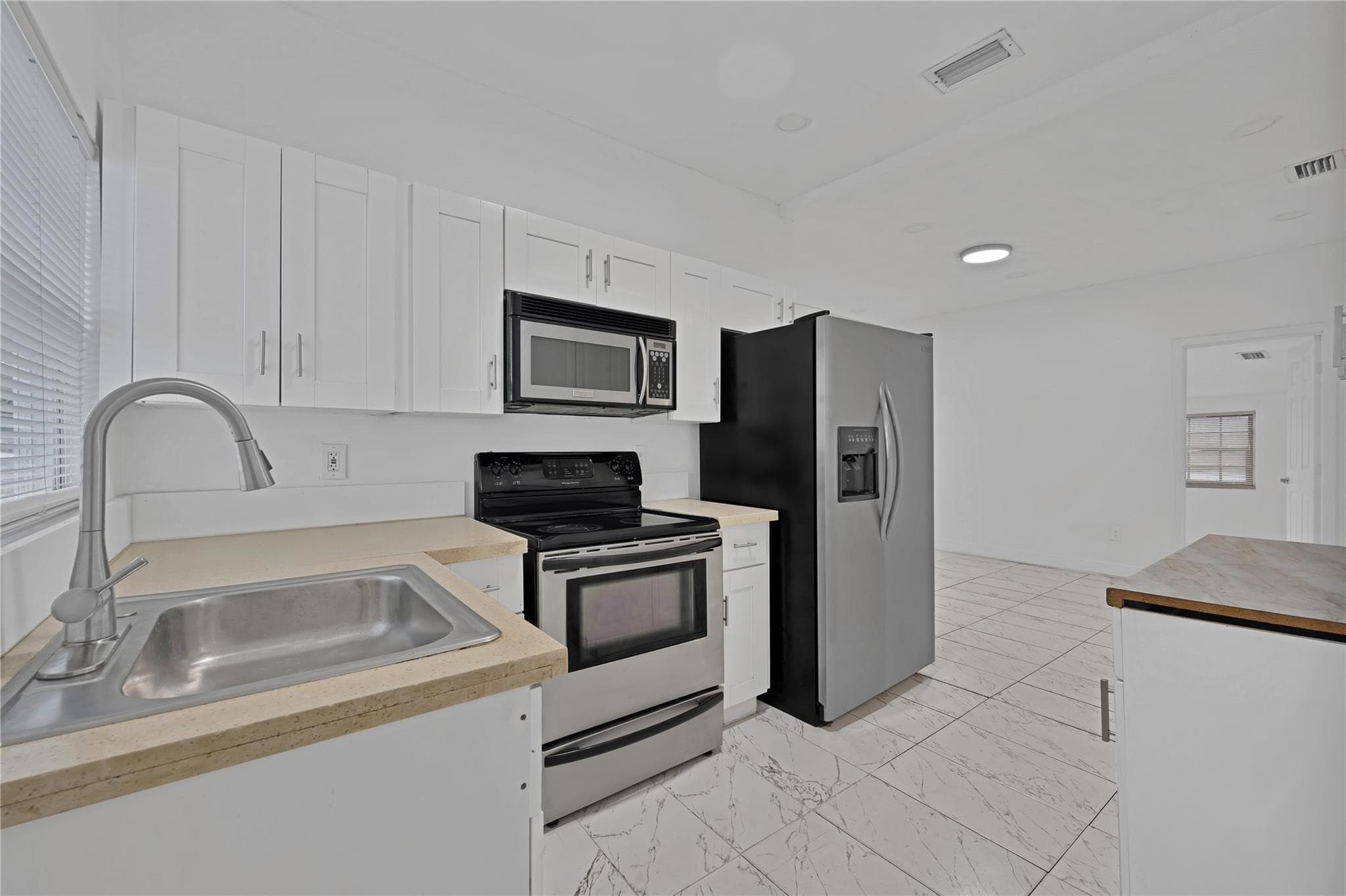 1114 NW 39th Street, Miami, FL 33127 — photo 5 of 23